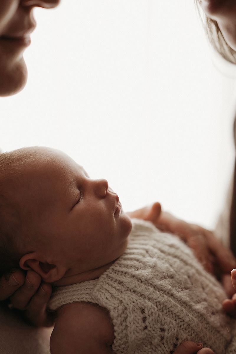 Newborn photographer capturing timeless moments in Armstrong creek studio