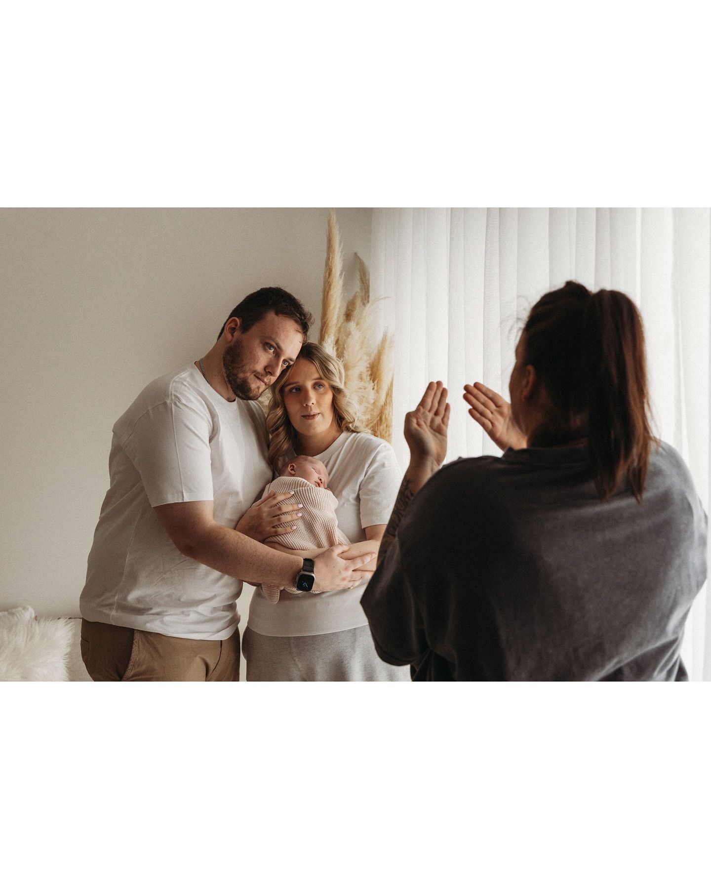 lou Lou pictures directing a newborn photoshoot