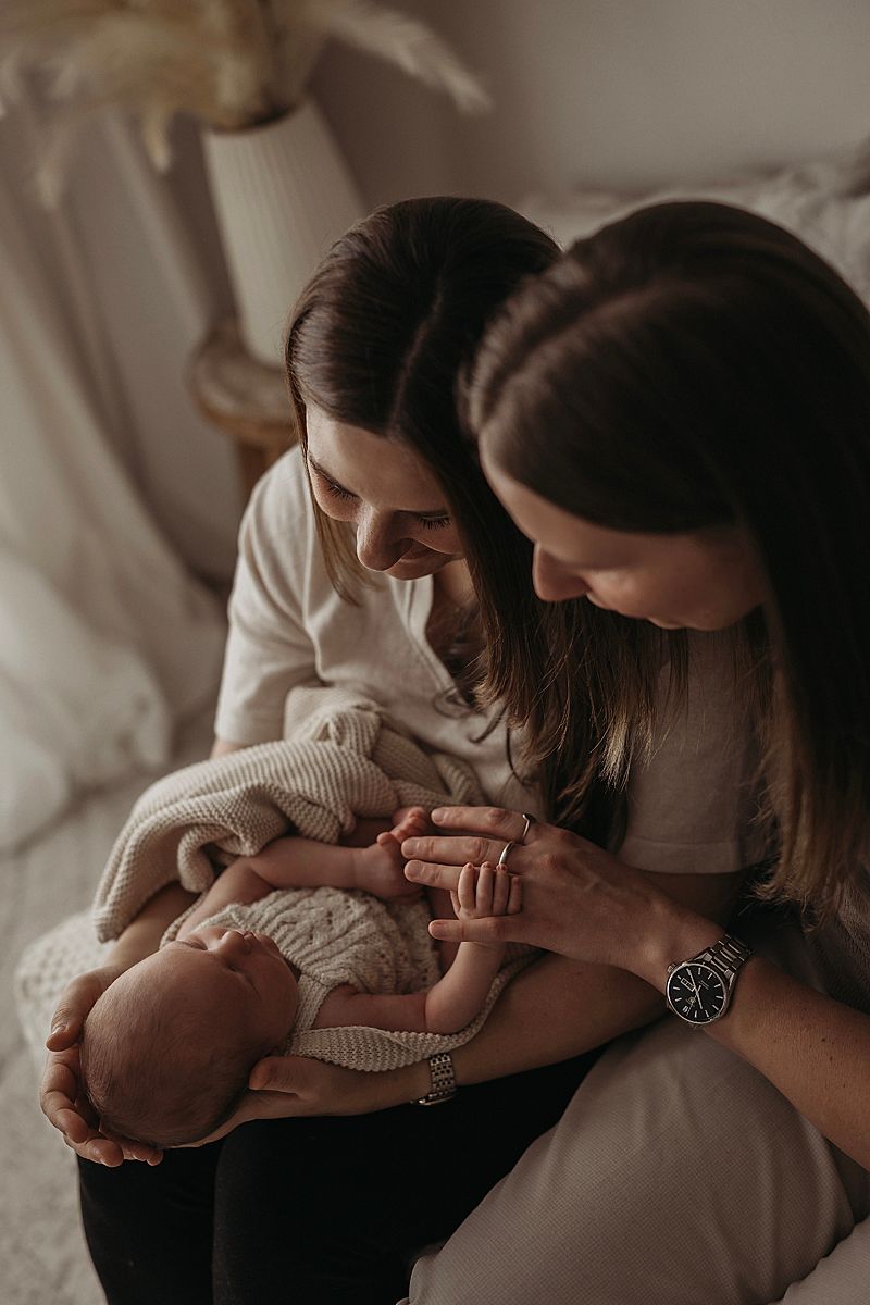 emotional parents and sweet baby moment newborn photography geelong