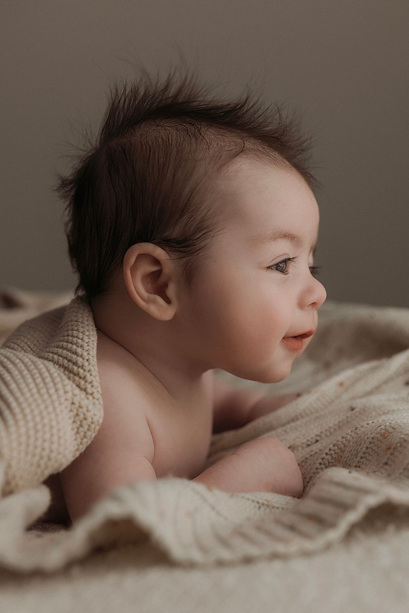 older baby 3 months old photography session held in Armstrong creek home studio baby holding head up