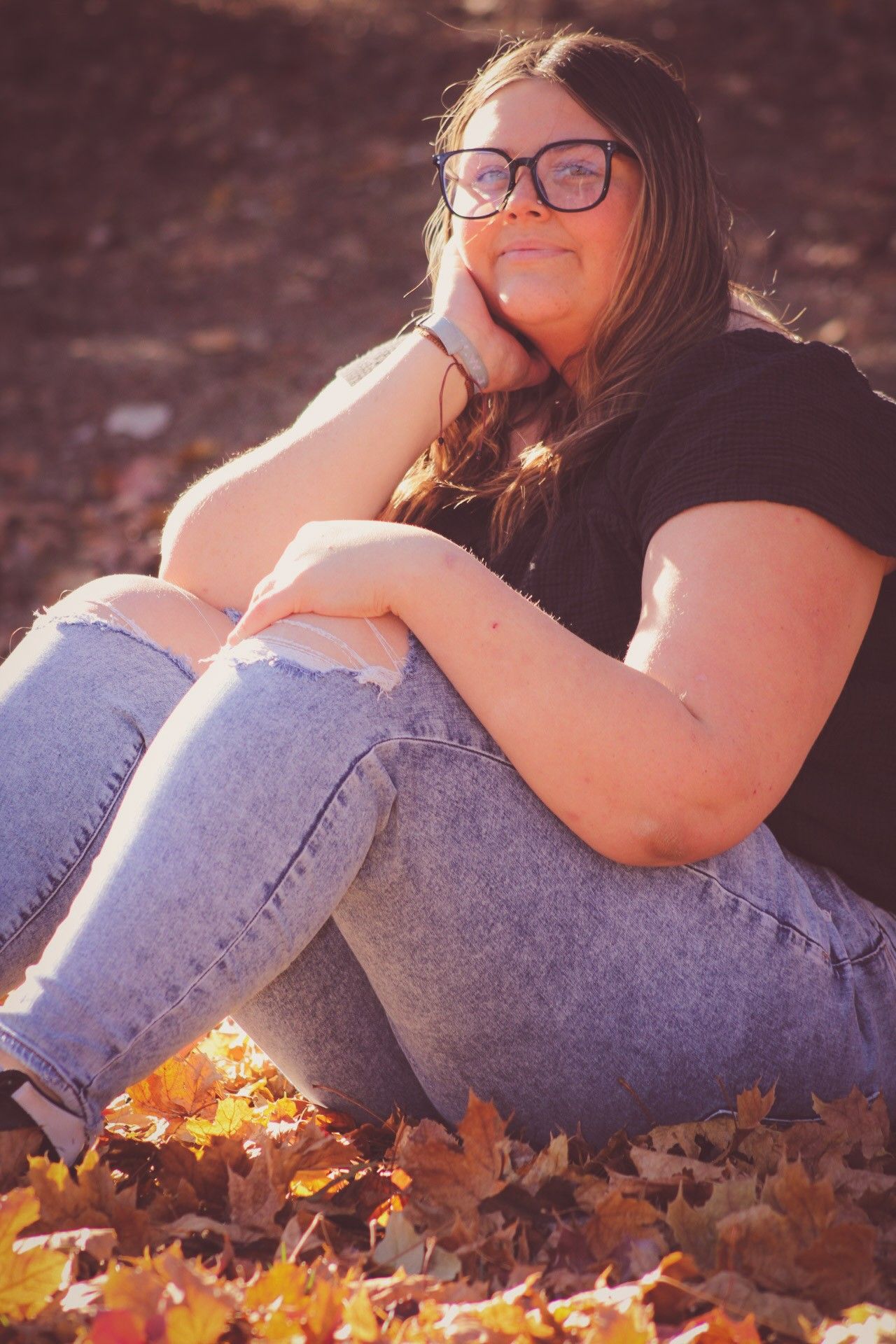 Senior portrait in fall leaves, Trinity Heights, Sioux City, Iowa
