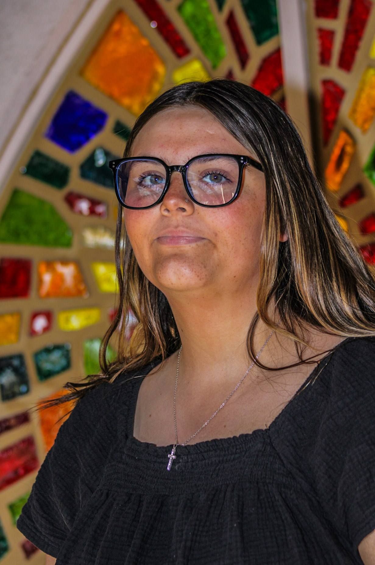 Senior portrait of female inside religious art, Trinity Heights, Sioux City, Iowa