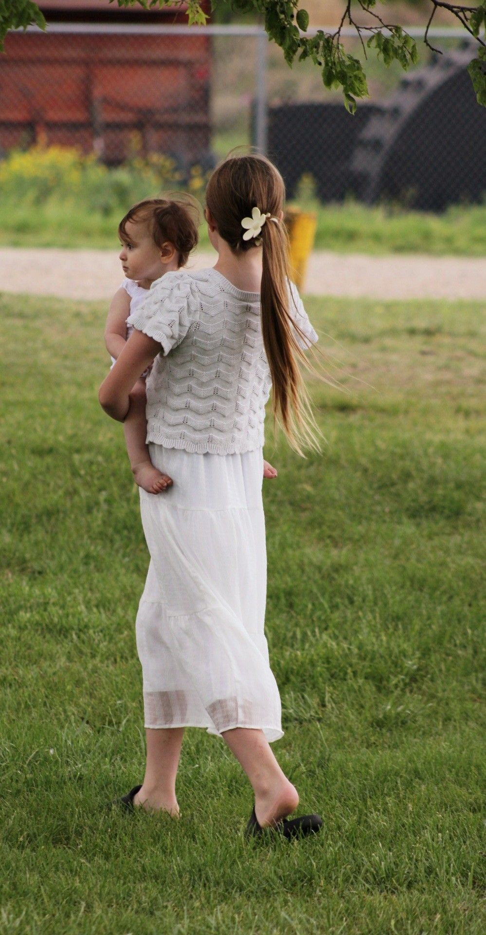 Portrait of girl and baby springtime, Headid Park, Sioux City, Iowa