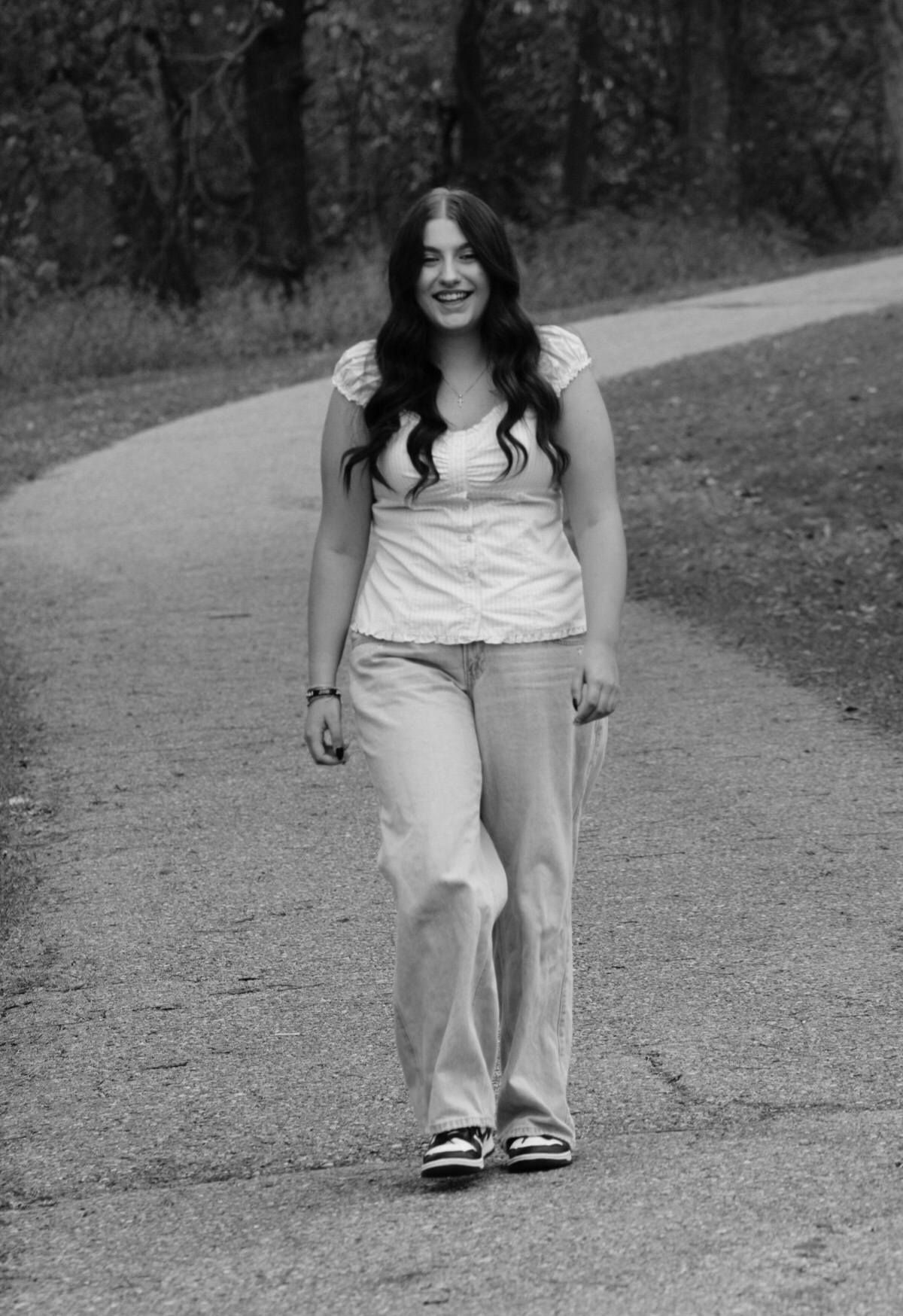 Senior portrait of female on walking path, Bacon Creek Park, Sioux City, Iowa