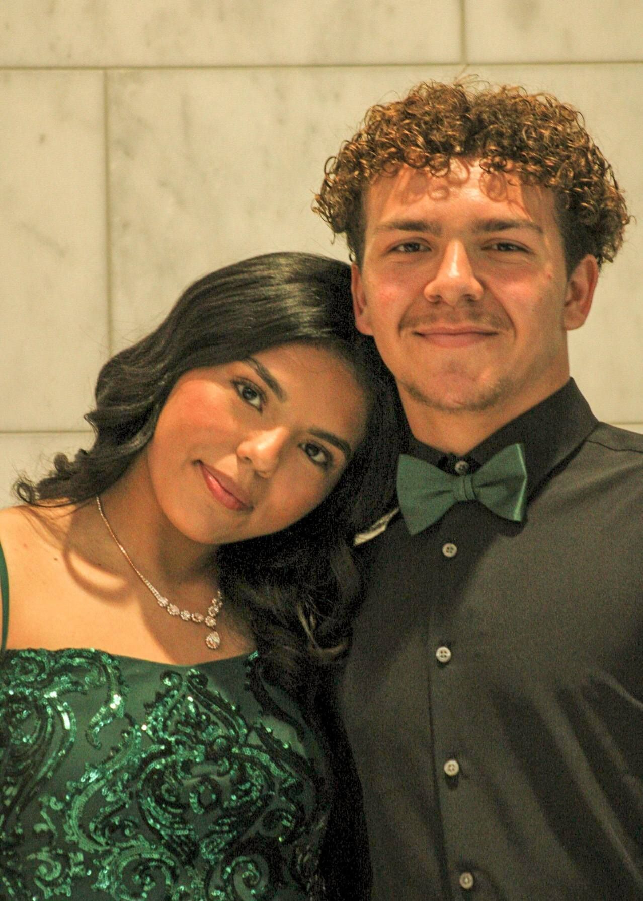 Portrait of a couple posing for Homecoming, Warrior Hotel, Sioux City, Iowa