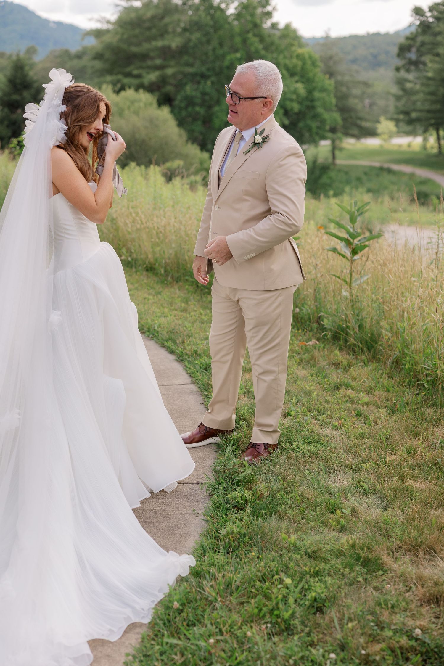 A series of first look photos showing a bride and father sharing an emotional moment outdoors.