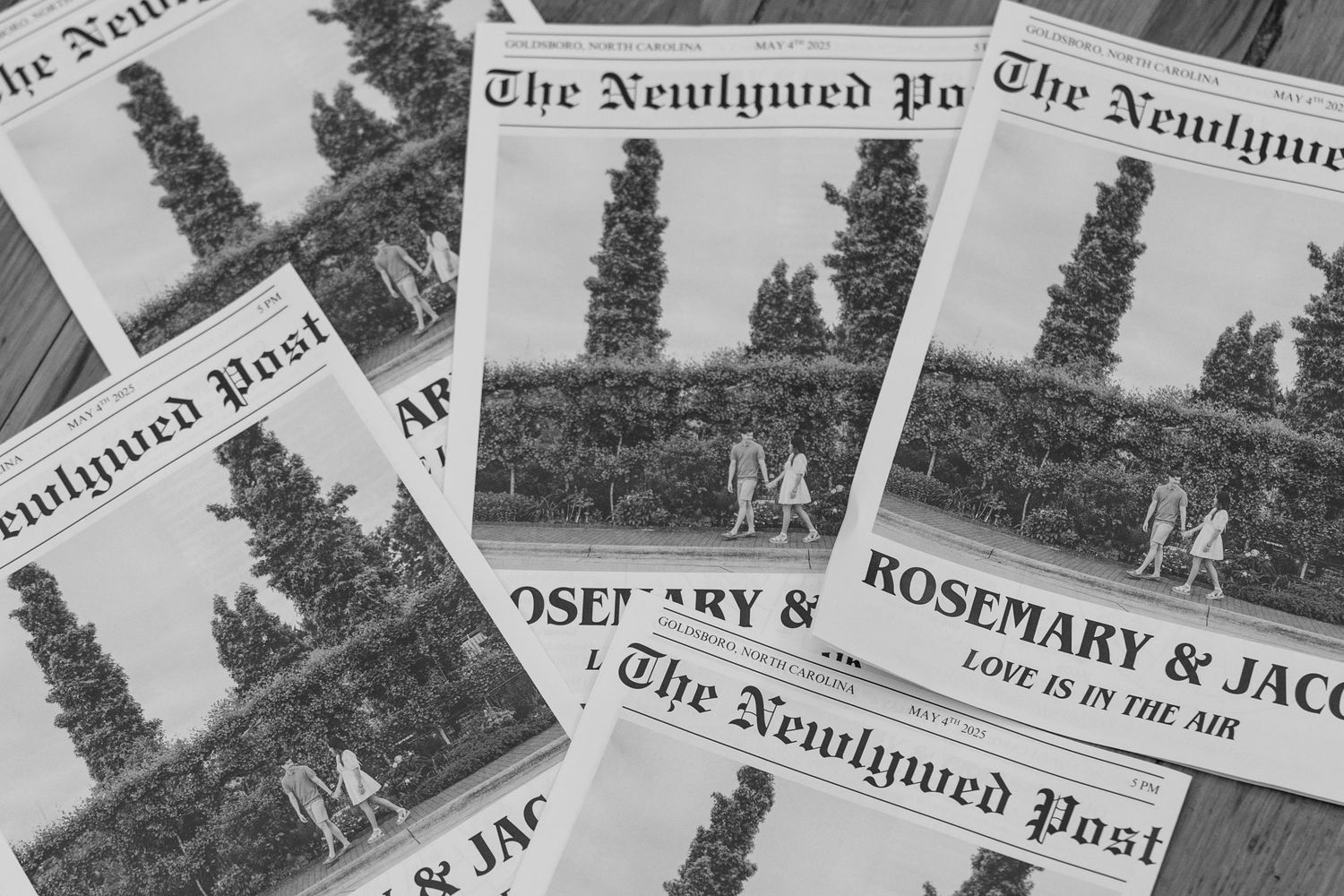 Black and white newspaper clippings featuring vintage headlines and text arranged in a collage pattern.
