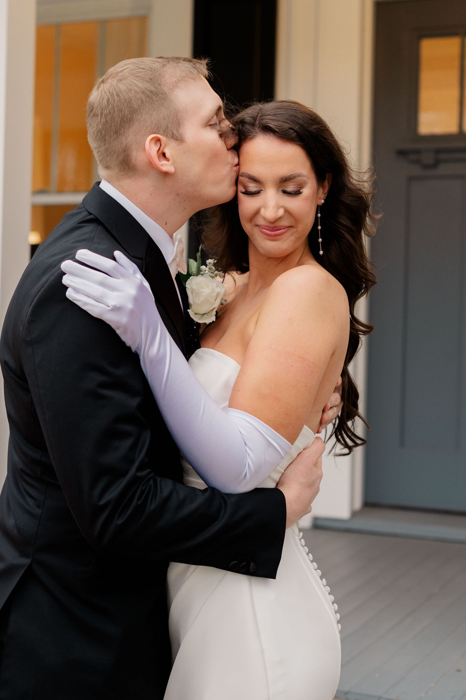 An intimate series of wedding photos showing tender moments between a couple on a covered porch.