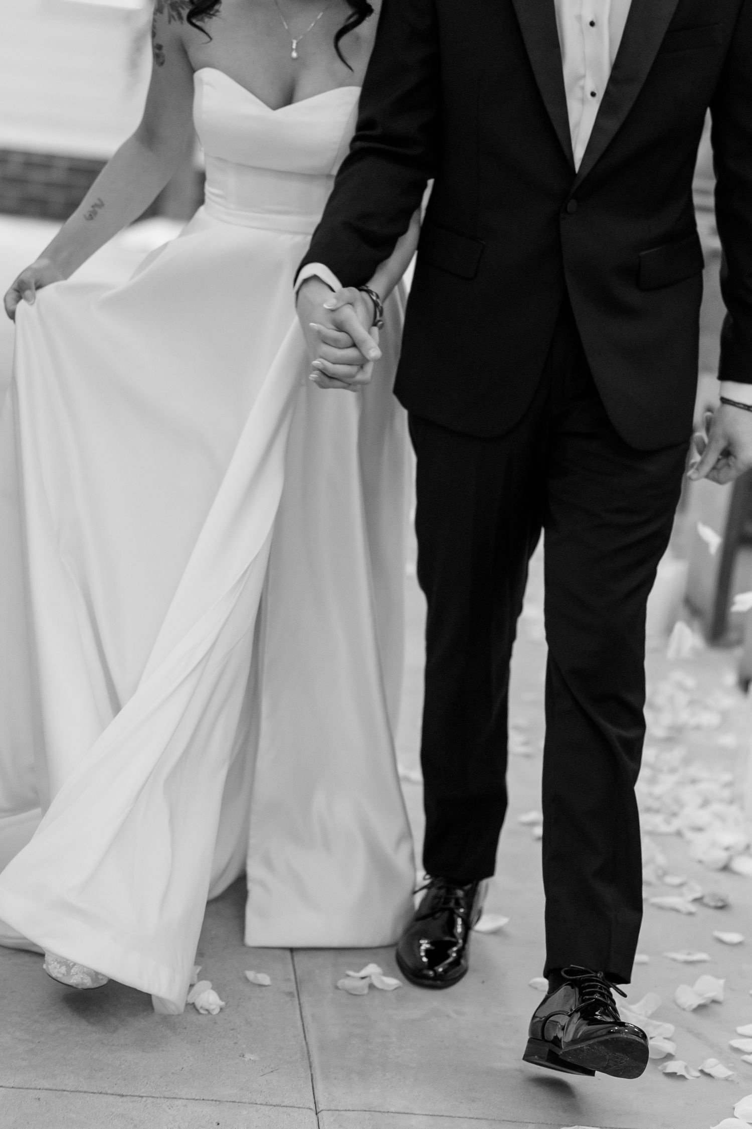 Cropped detail shots show the bottom half of a bride in white dress and groom in black tuxedo walking together.