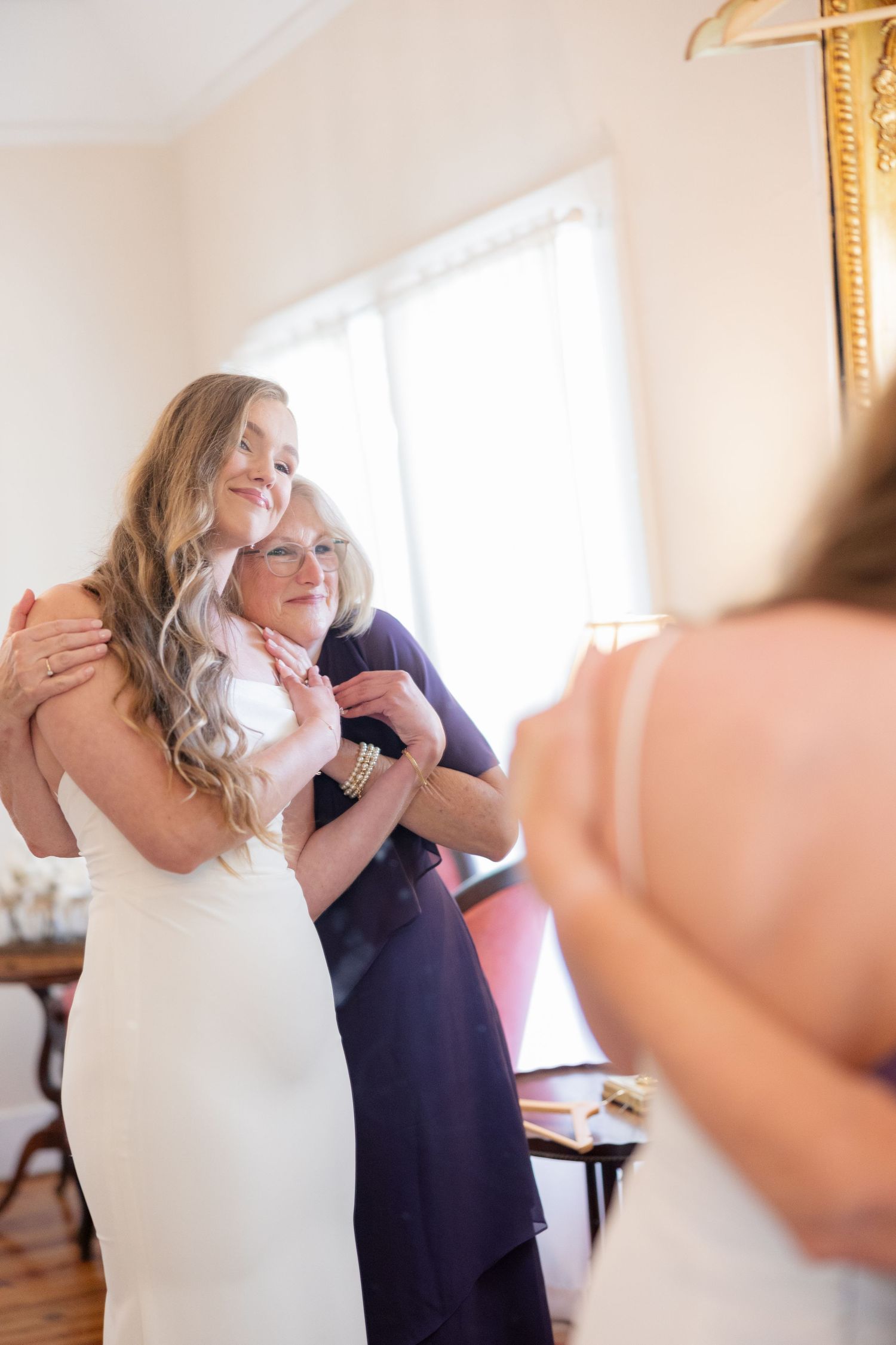 A sequence of emotional moments during a wedding ceremony showing laughter and interaction.