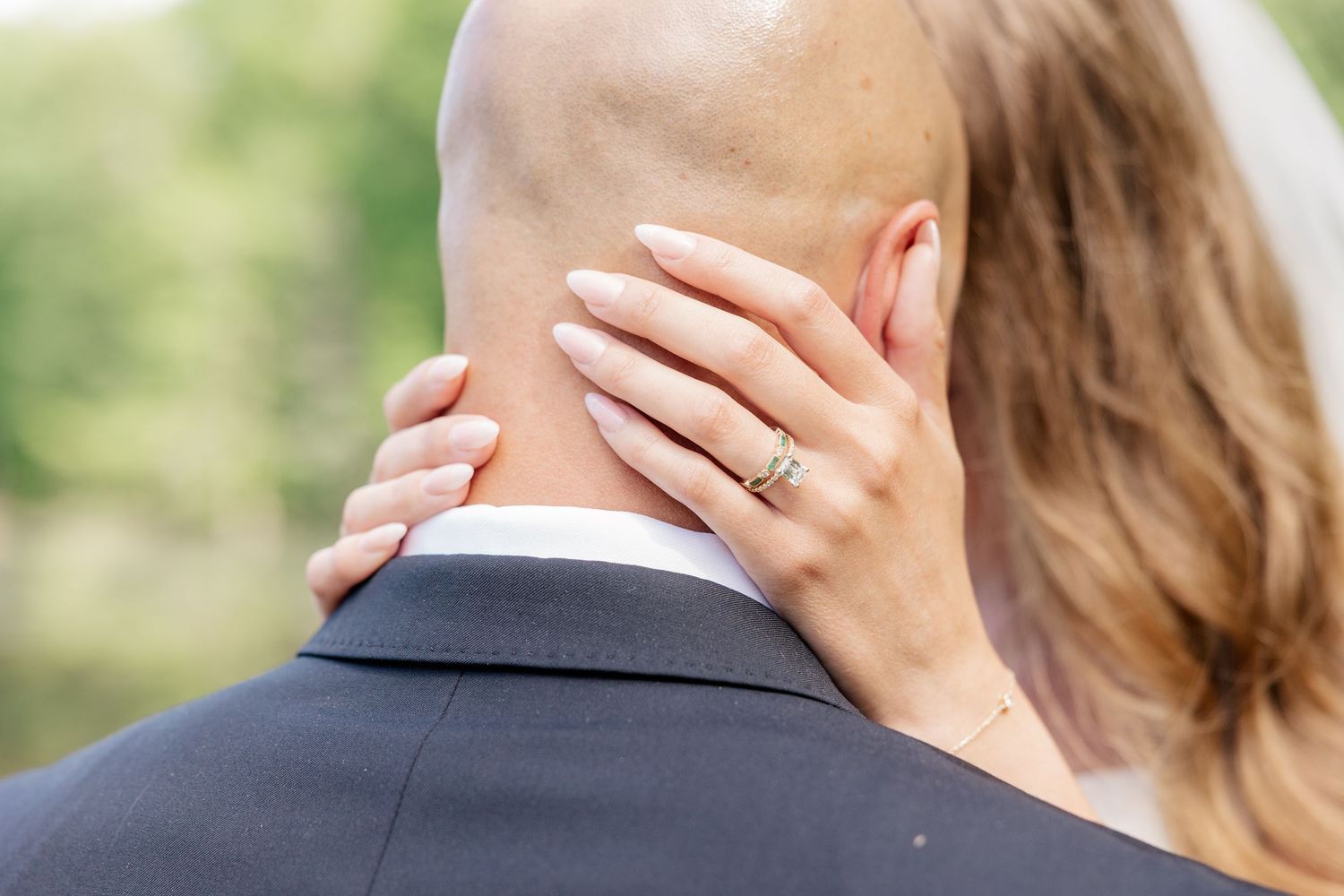 A series of five connected photos showing romantic poses between a couple in a natural outdoor setting.