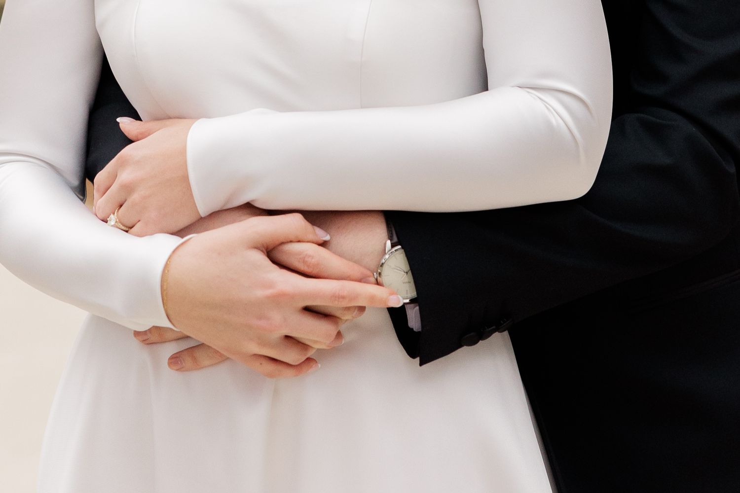 Close-up of formal black and white attire showing elegant details.