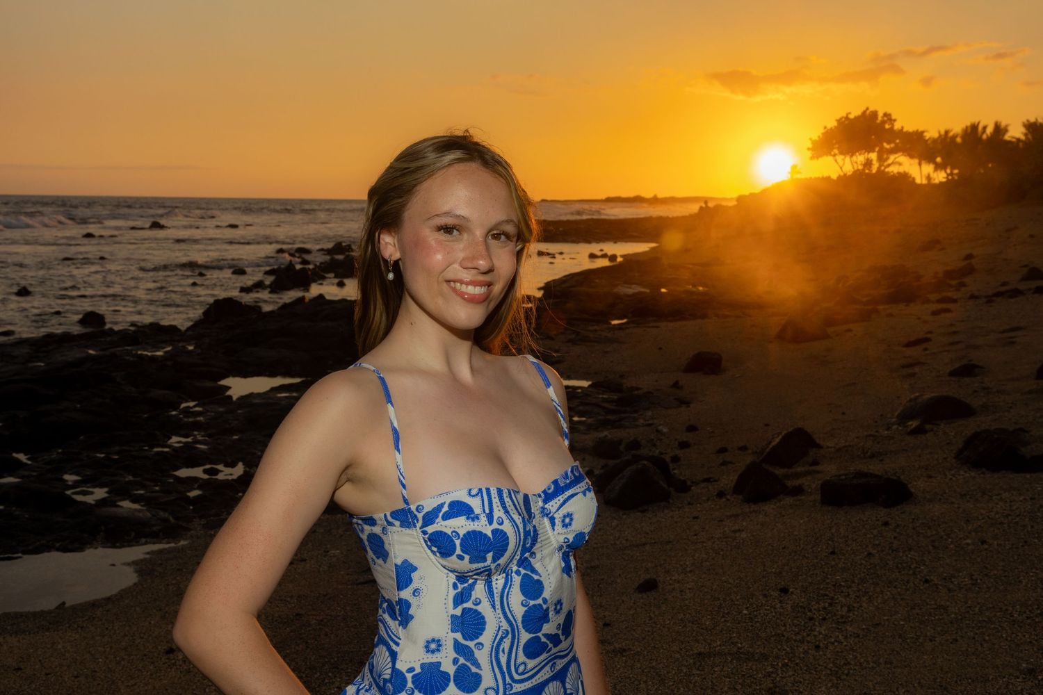 Sunset beach portrait of a teenage girl in Kailua-Kona captured by our Big Island portrait photographer. *