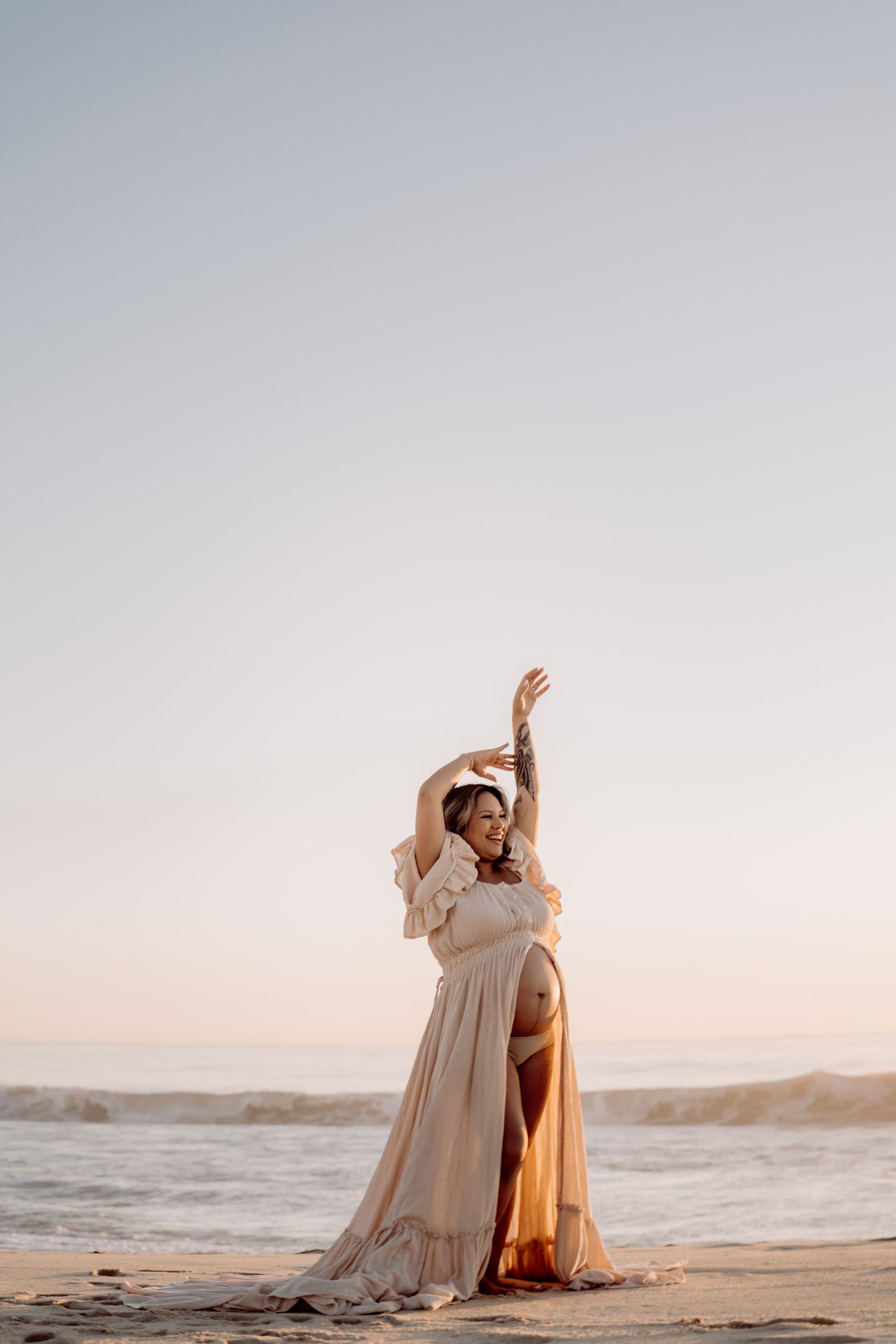 Five ethereal beach photographs of a figure in flowing cream-colored dress dancing gracefully against a sunset coastline.