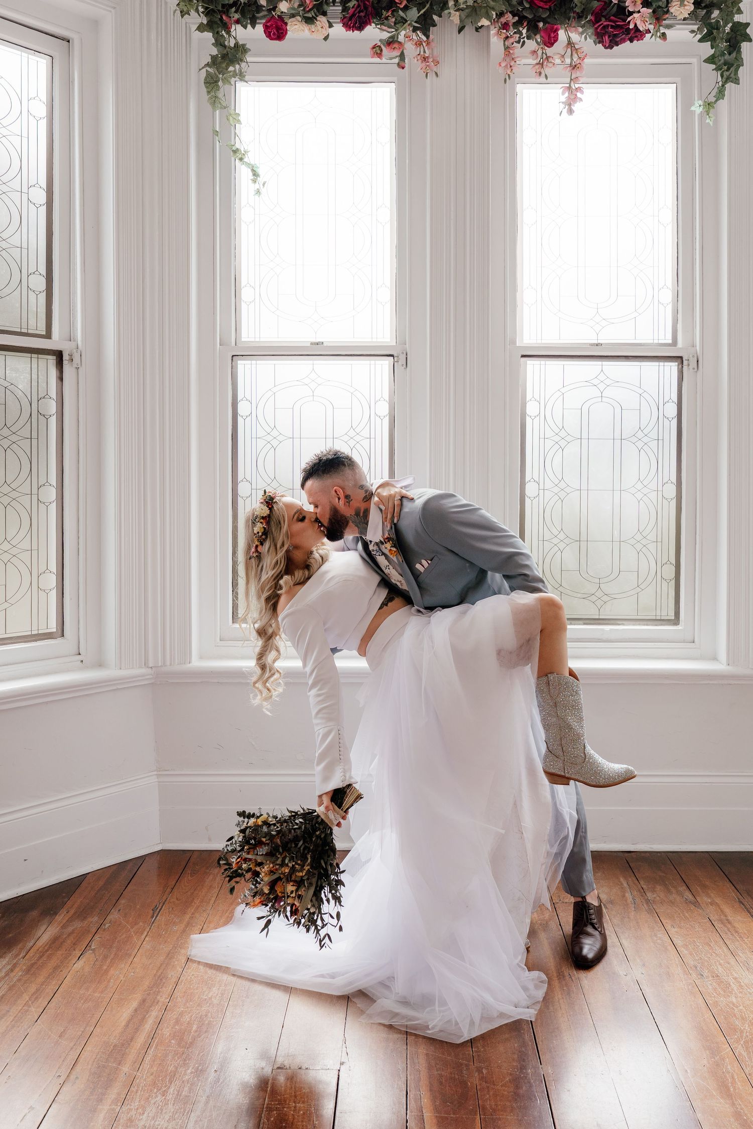 A sequence of photos showing a person in a white dress twirling and spinning in a bright sunlit room with wood floors.
