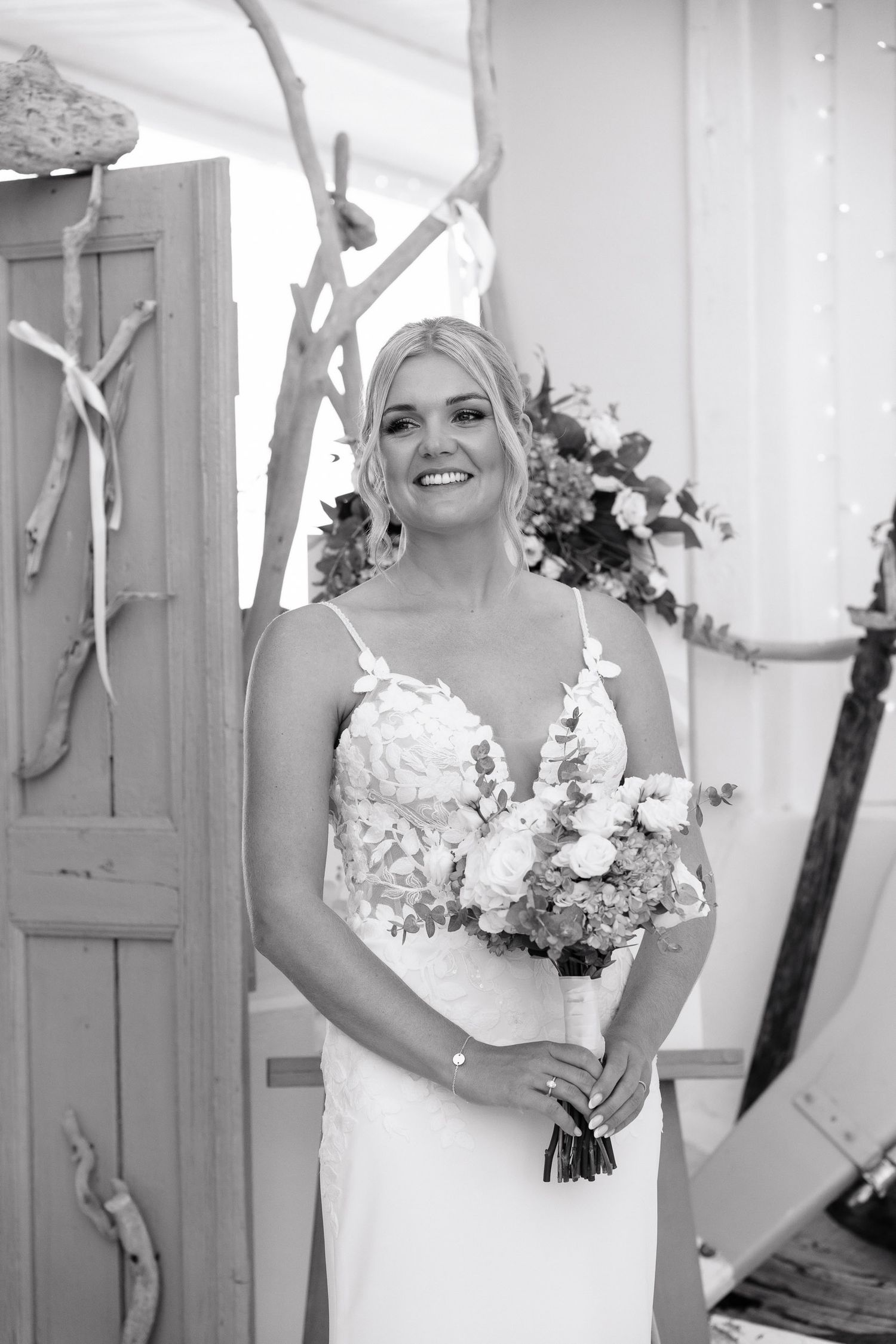 Black and white collage of bridal portraits showing wedding dress details and floral bouquets against a light background.