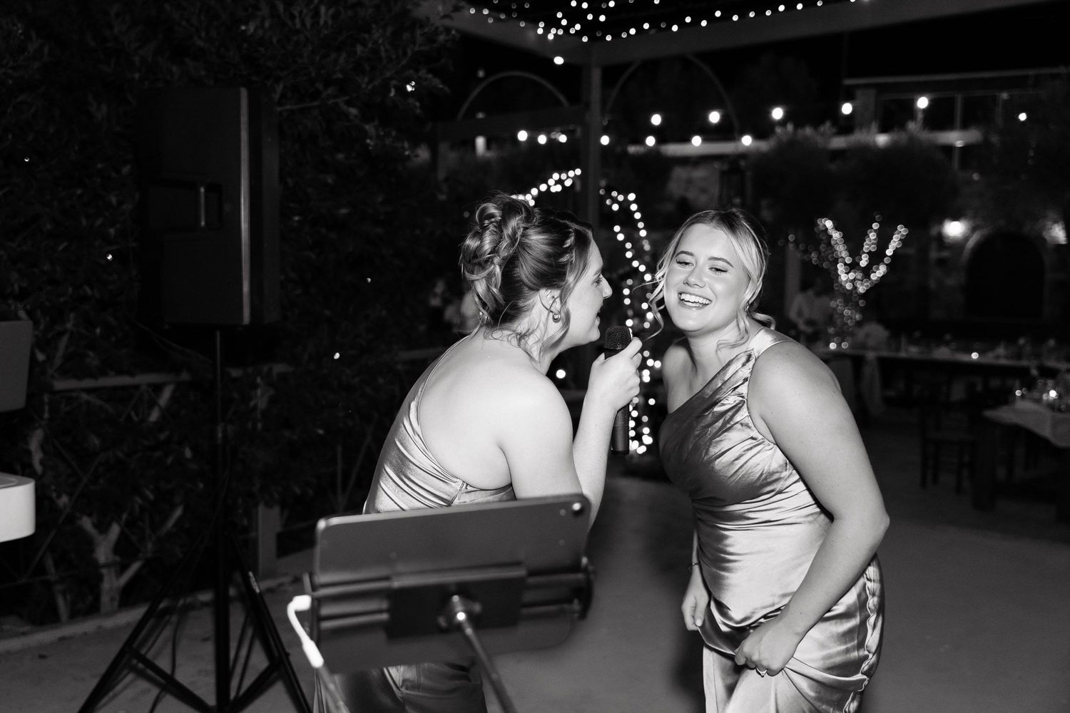 A series of candid dance photos showing couples dancing together at a dimly lit evening event.