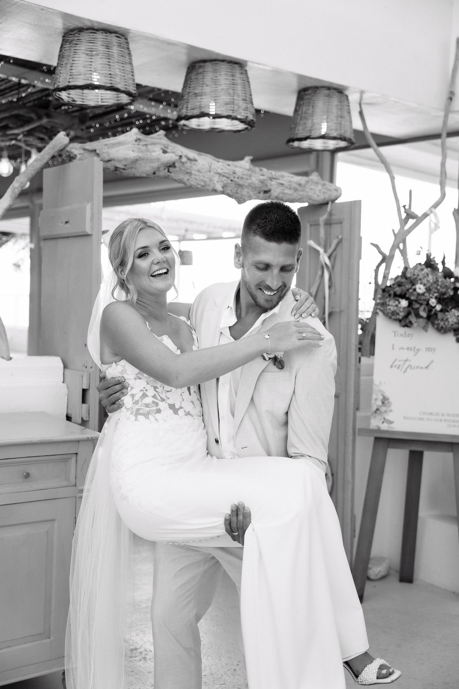Wedding celebration sequence showing happy couple dancing and embracing in an indoor venue with rustic decor.