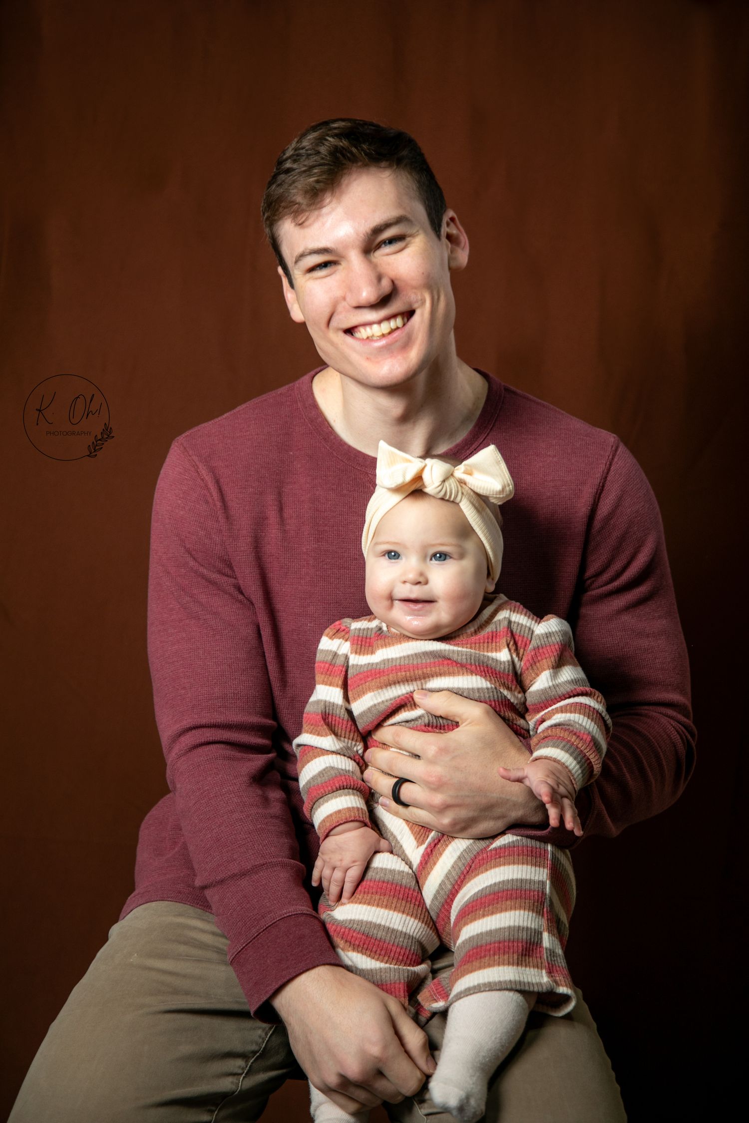 Heartwarming studio portraits showing parent and child interaction.