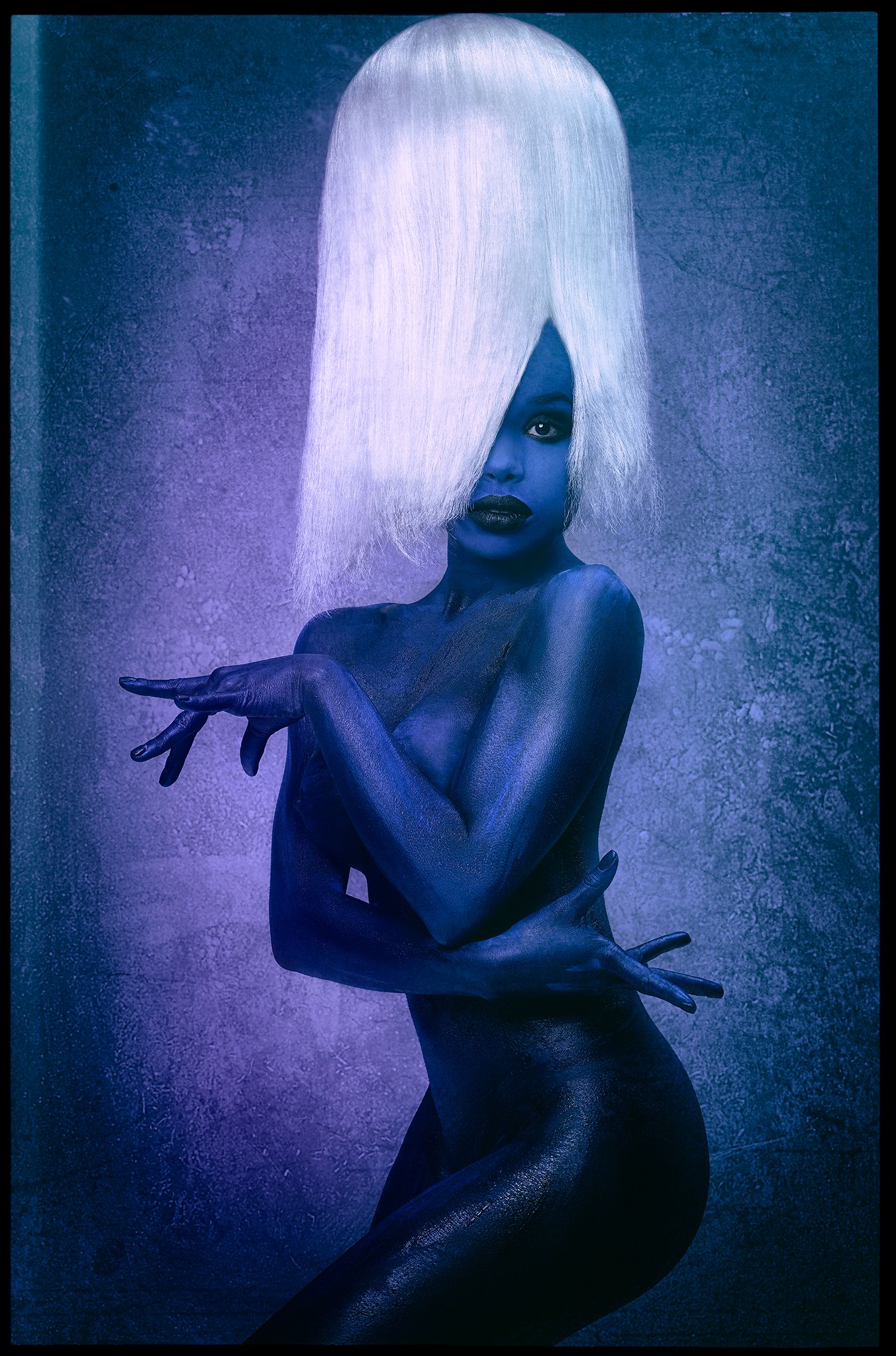 Artistic photo series showing four poses of a figure with white hair and blue skin against a purple background.