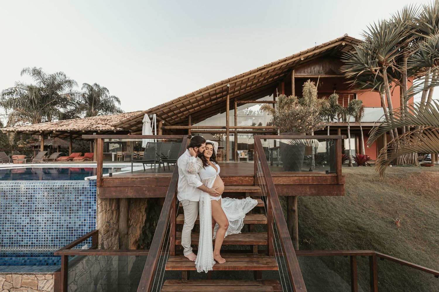 Wedding photography session at a rustic wooden venue with exposed beams and natural lighting.