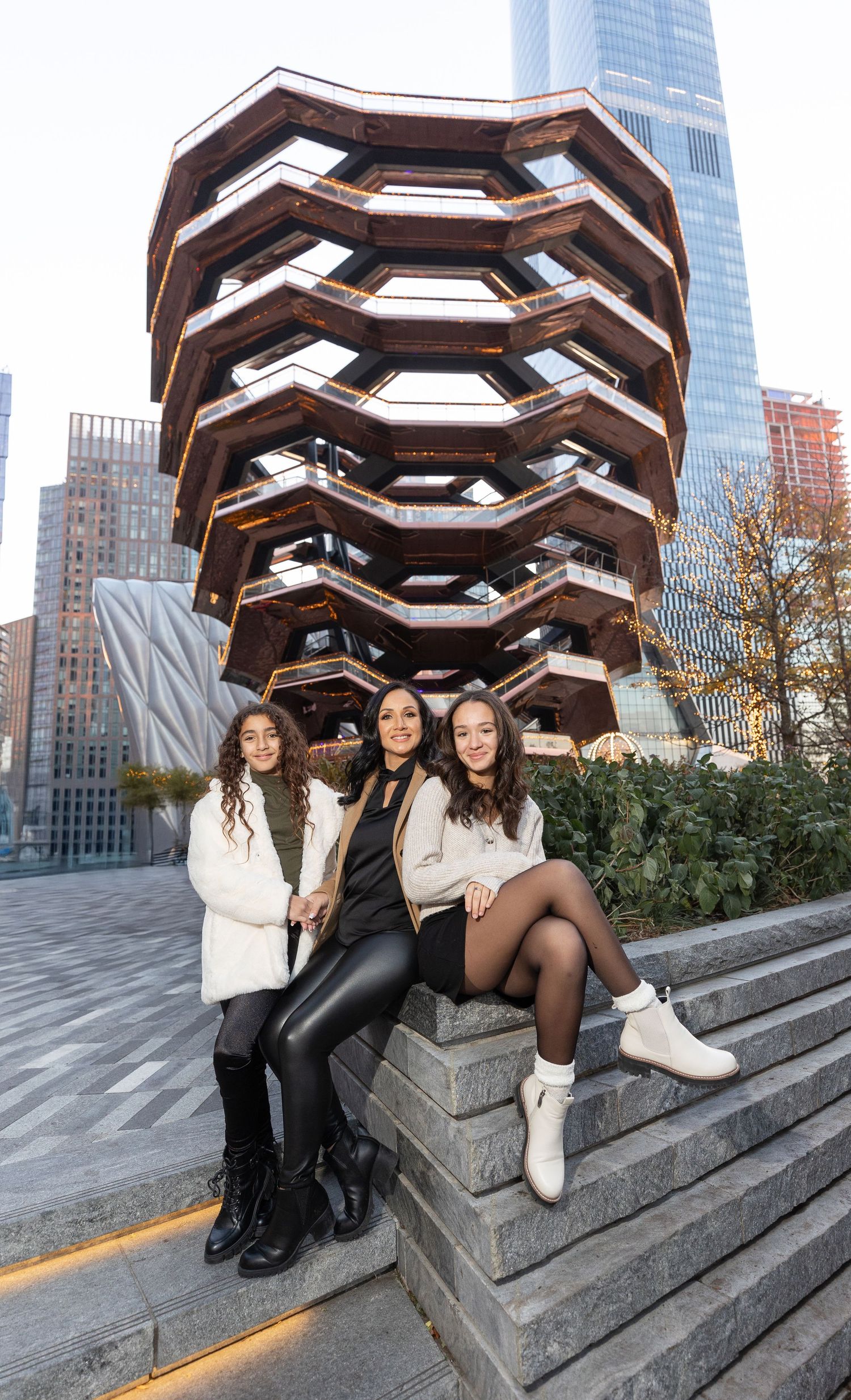 Group photo session on the steps of the Vessel structure in New York City's Hudson Yards.