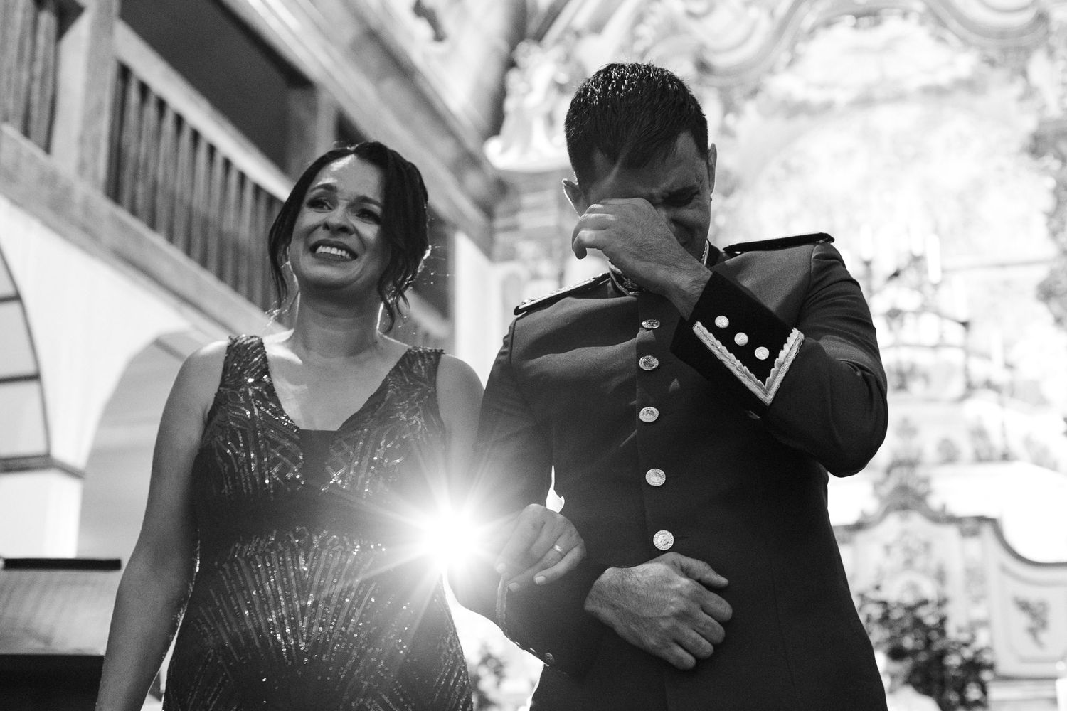 Black and white candid wedding moments capturing joy and celebration during a wedding ceremony.