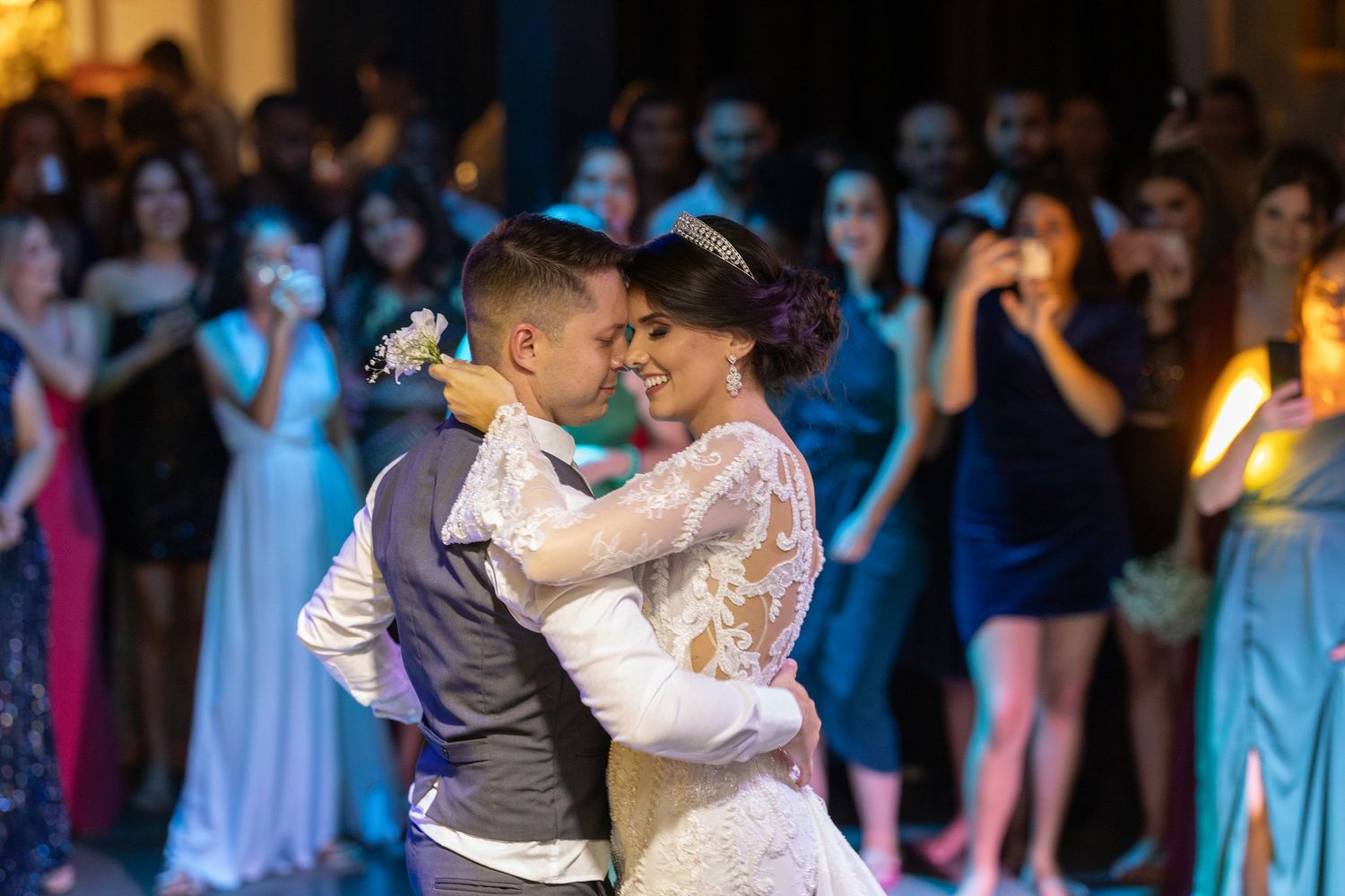 Wedding reception dance floor moments with romantic lighting and celebrations.