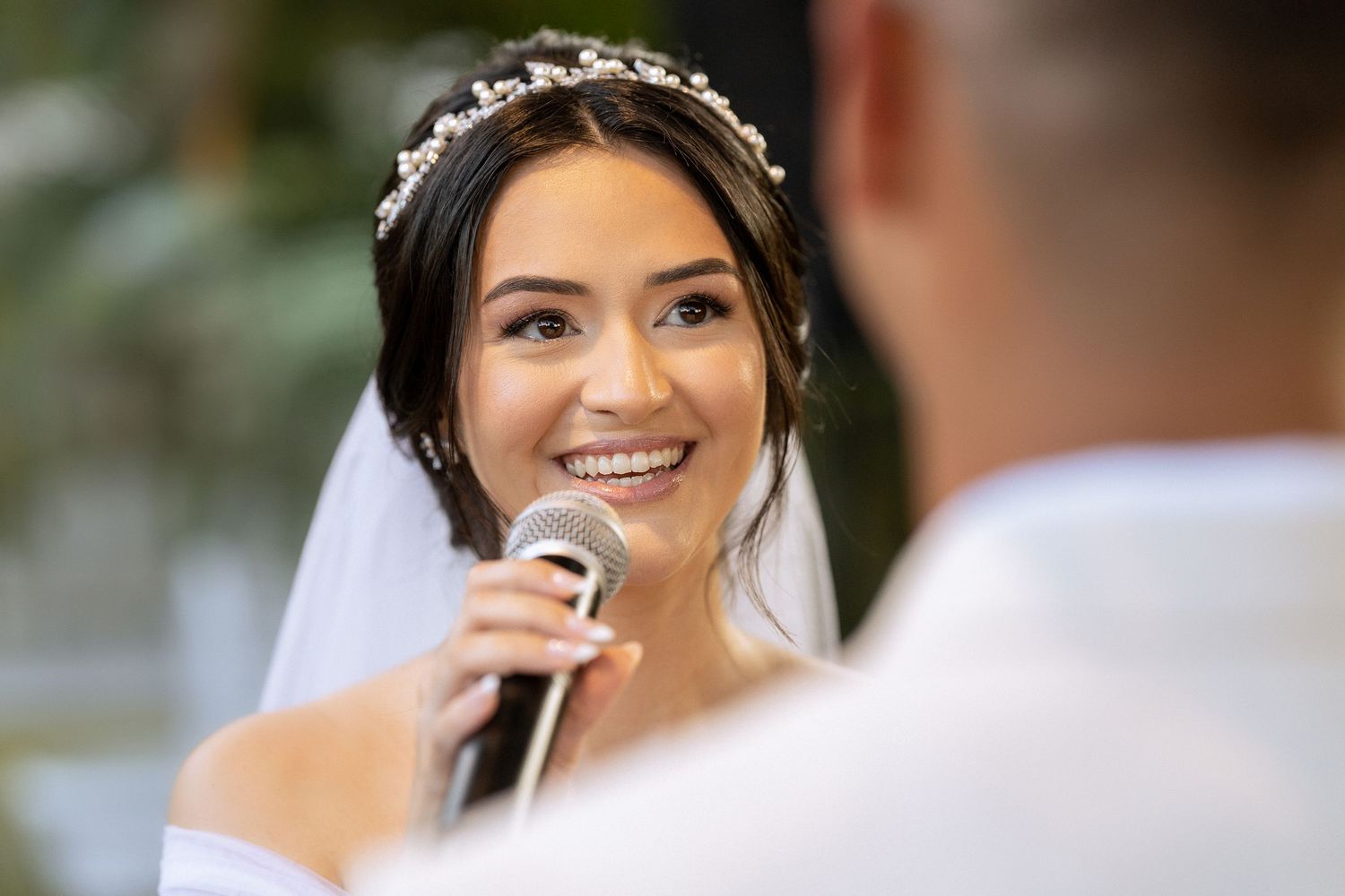 Close-up wedding portraits with delicate bridal accessories and natural lighting.