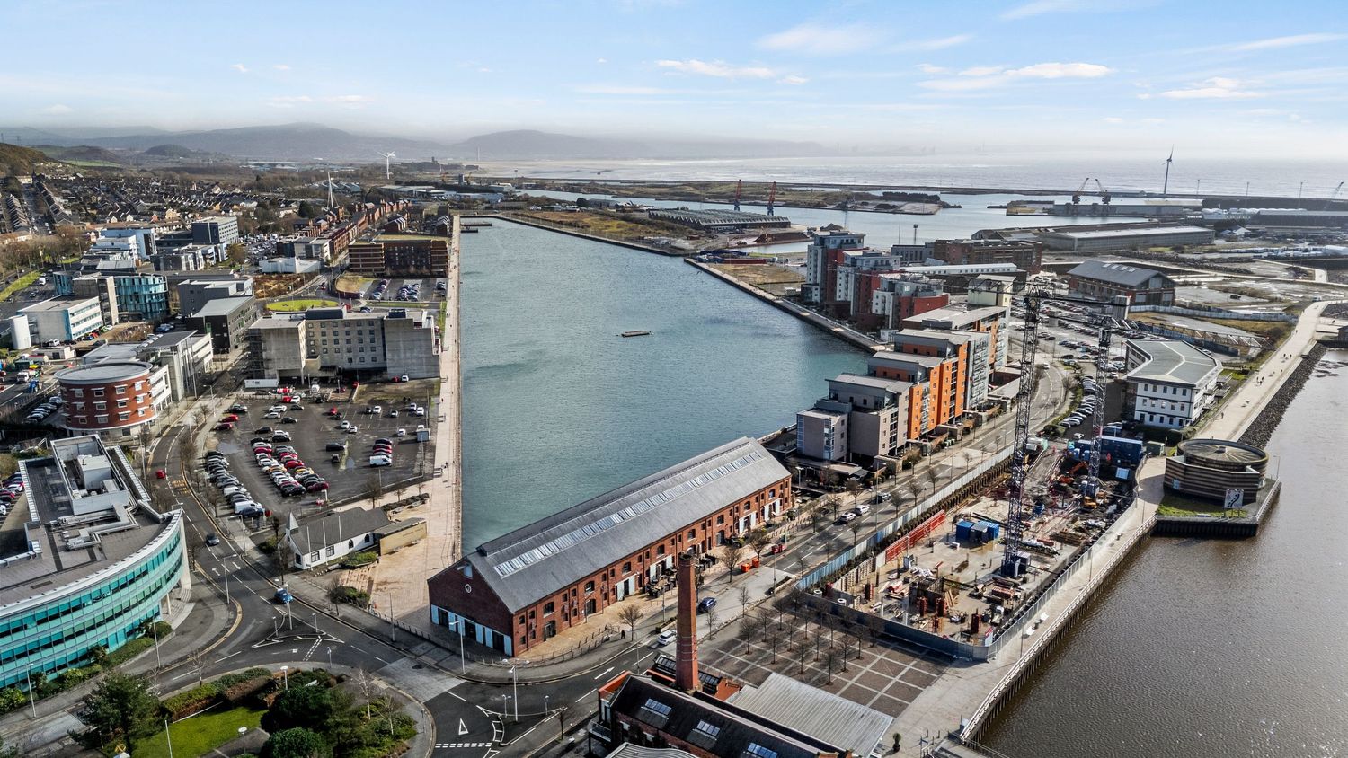 Aerial view of Liverpool waterfront showing urban development and river. SA1, Swansea, South Wales.
