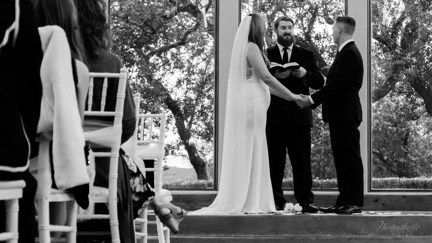 A black and white collage of wedding moments showing couples and wedding party members at an outdoor ceremony.