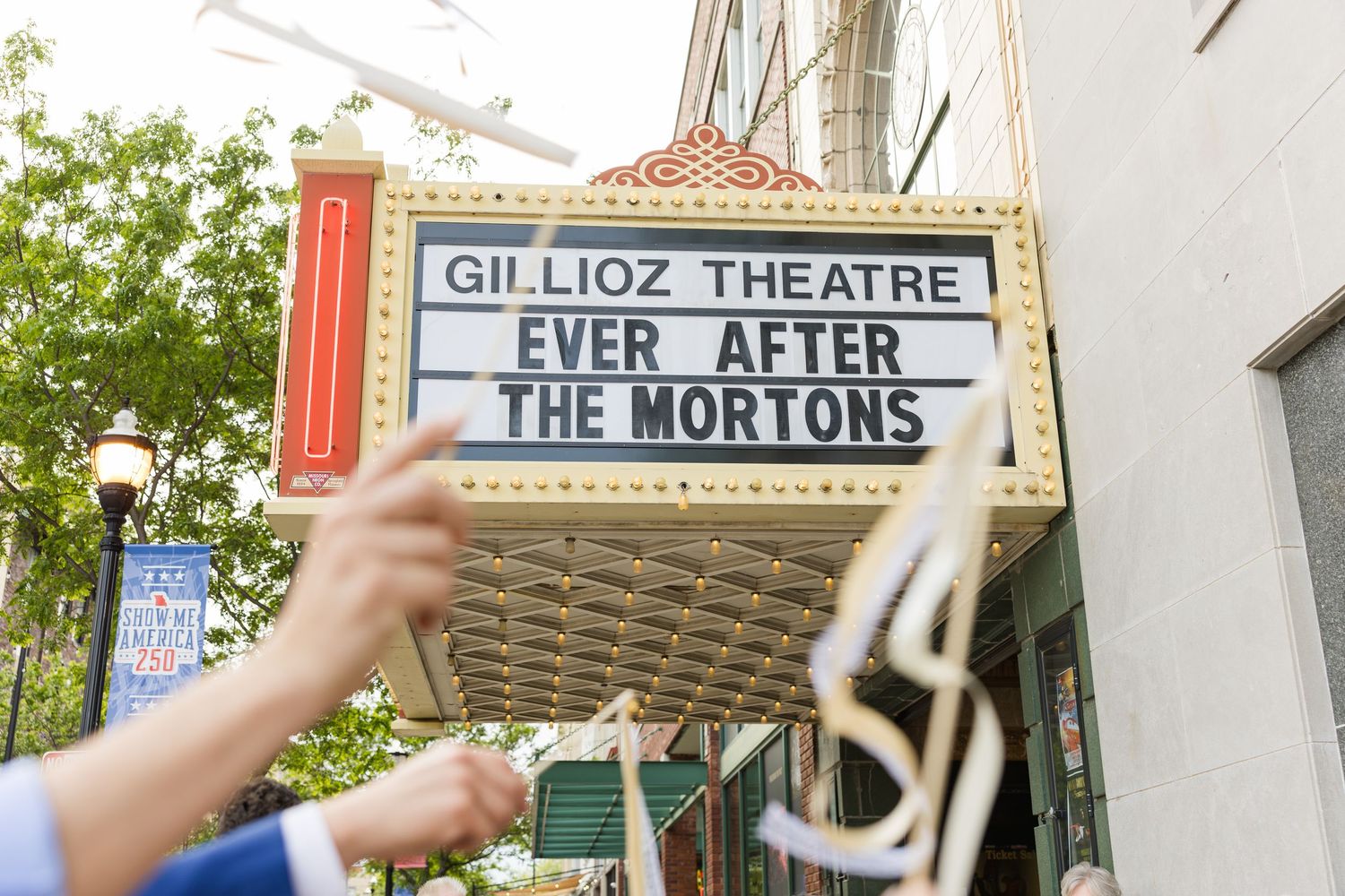 Gillioz Theatre marquee sign reads Ever After The Mortons for a wedding celebration announcement.