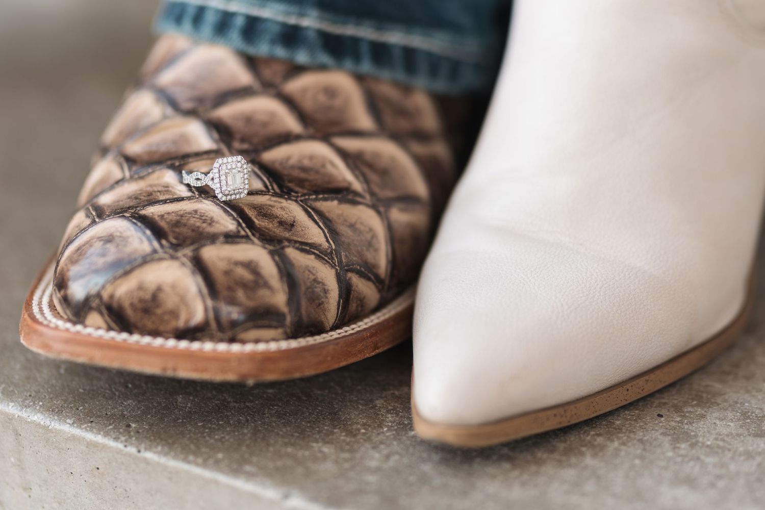Close up of contrasting wedding shoes showing a diamond ring detail.