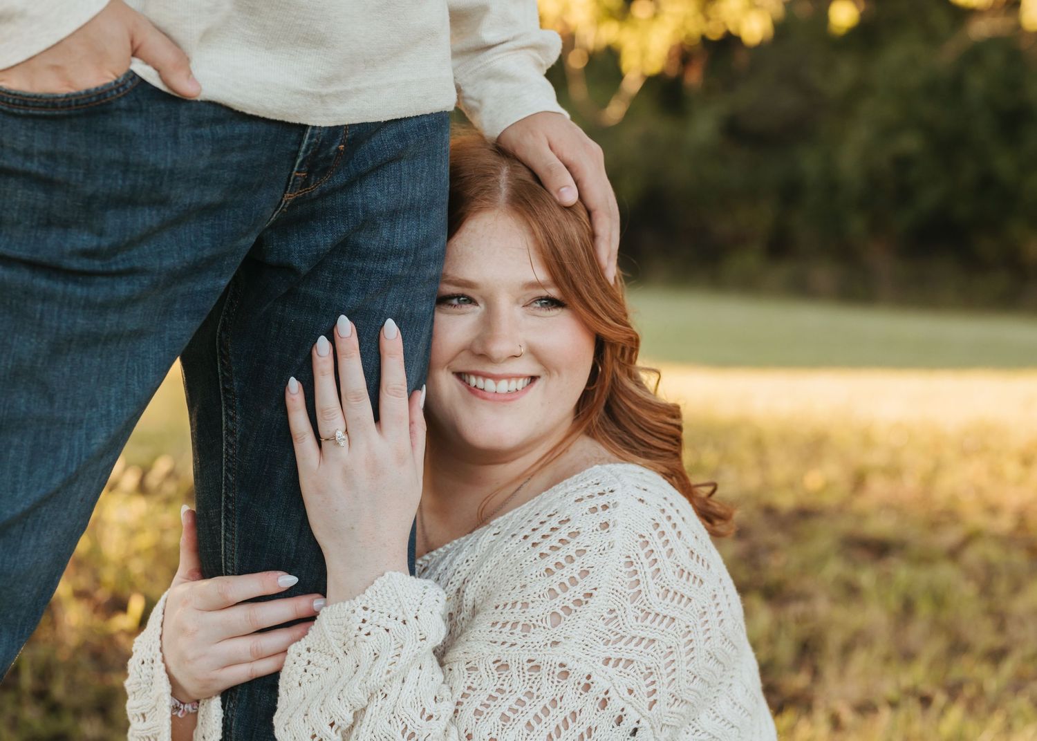 Candid moment captured during an outdoor autumn photo session.