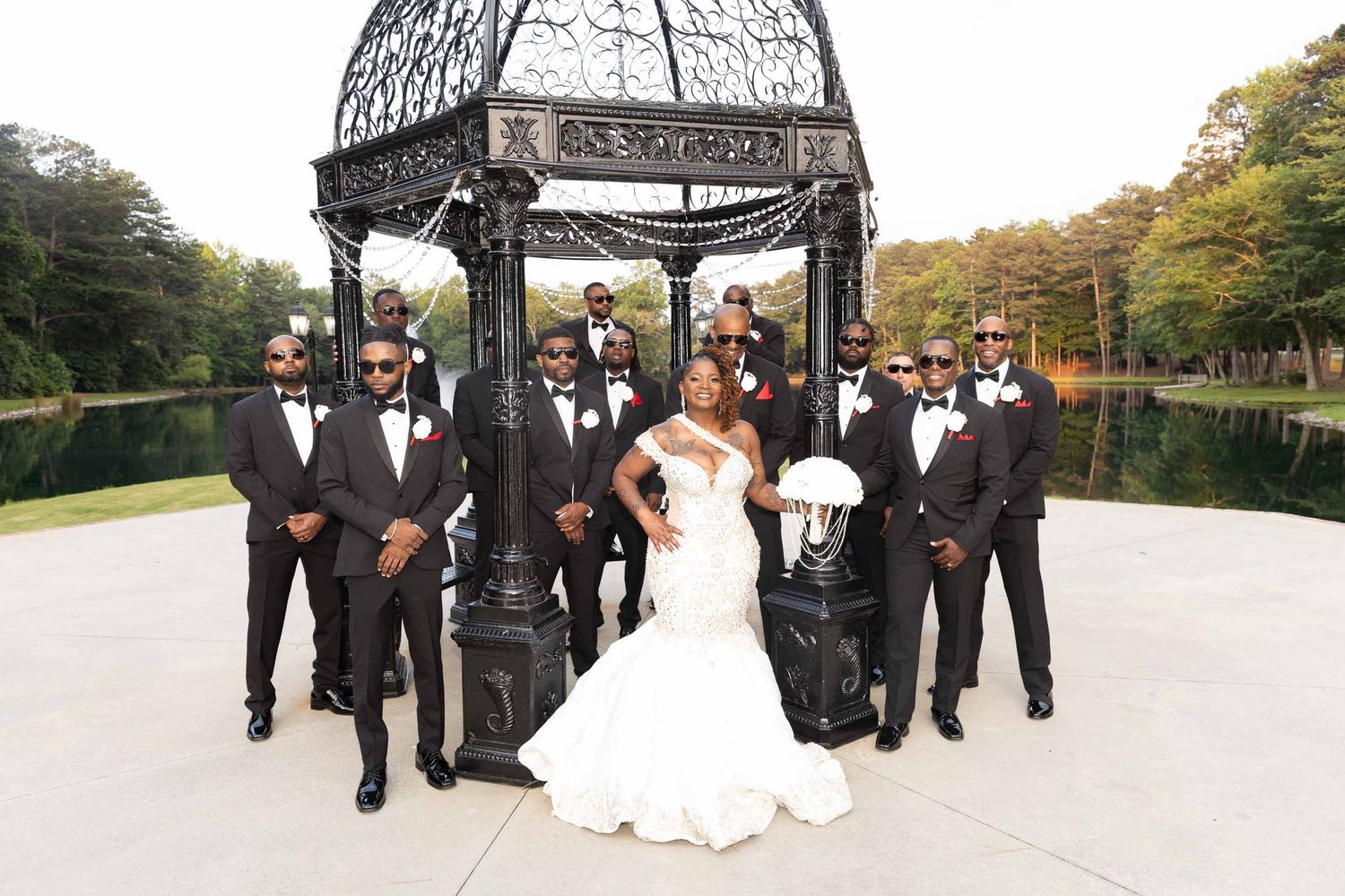 Bride and groomsmen posing outside Pristine Chapel wedding venue