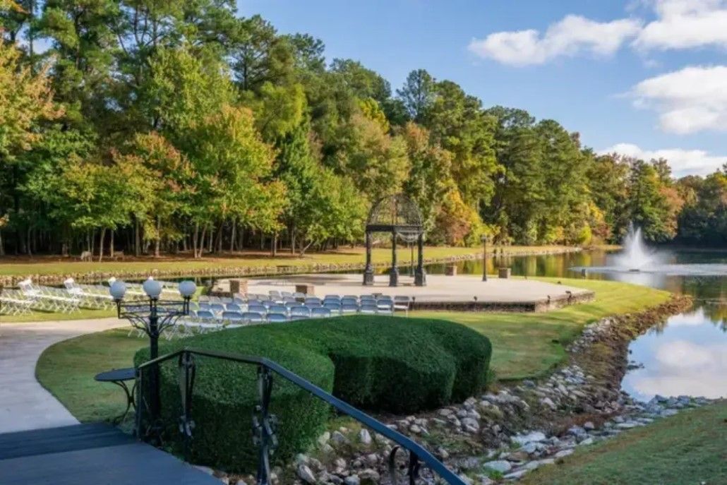 Outdoor lakeside wedding ceremony setup at Pristine Chapel in Atlanta, GA.