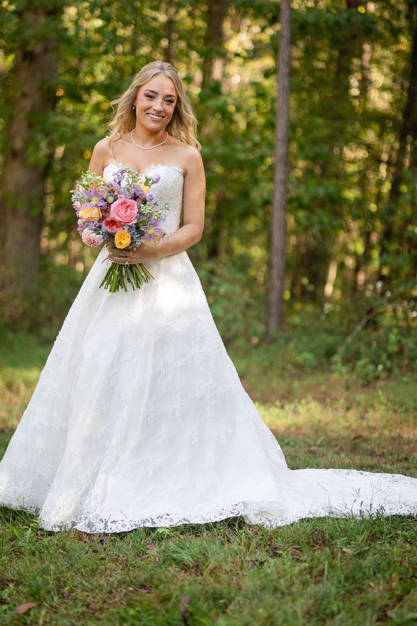 Close-up of bride’s floral bouquet during vineyard wedding in Georgia