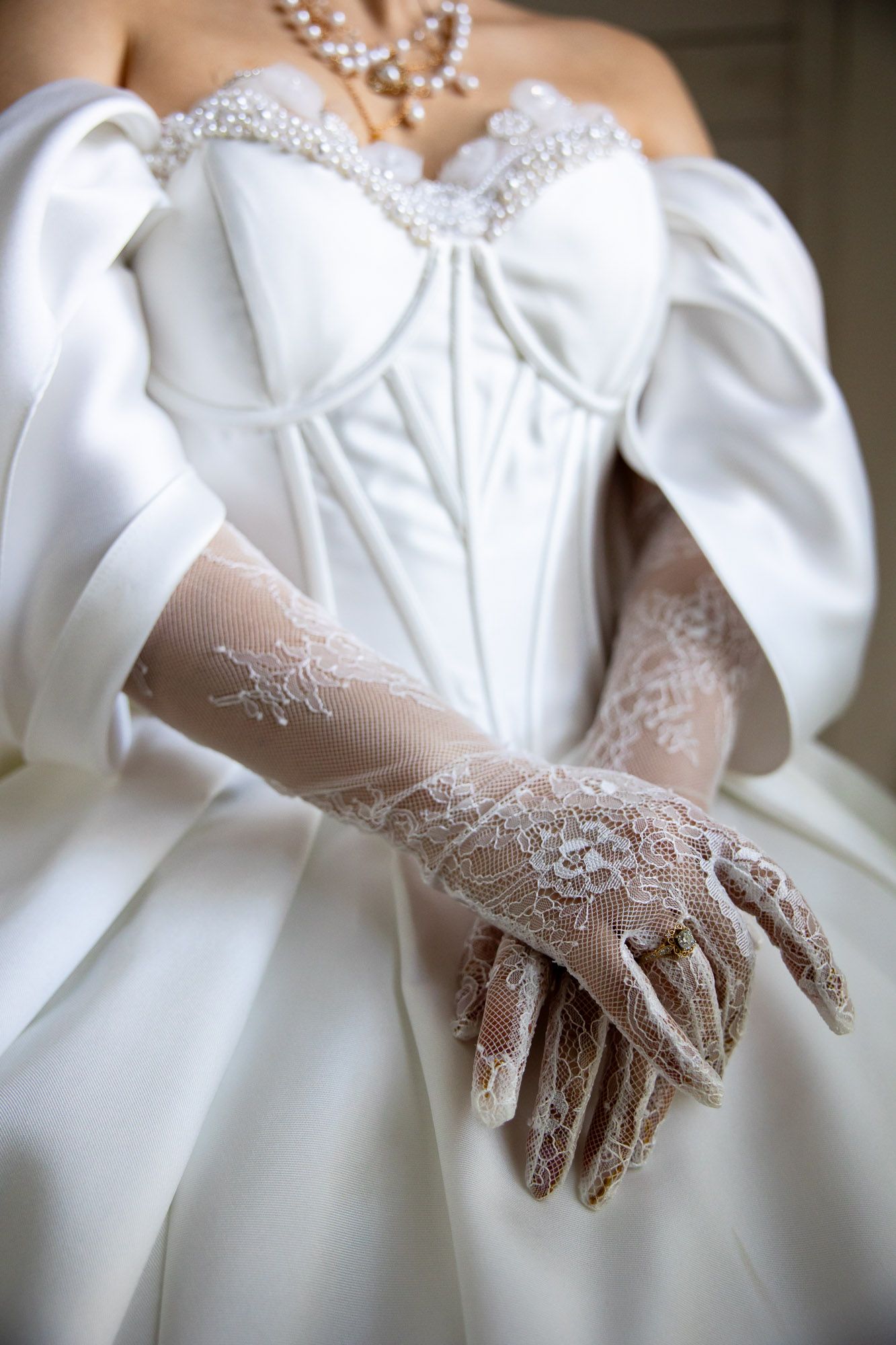 Close-up view of a Luxury Atlanta brides wedding dress at Rocky's Lake Estate