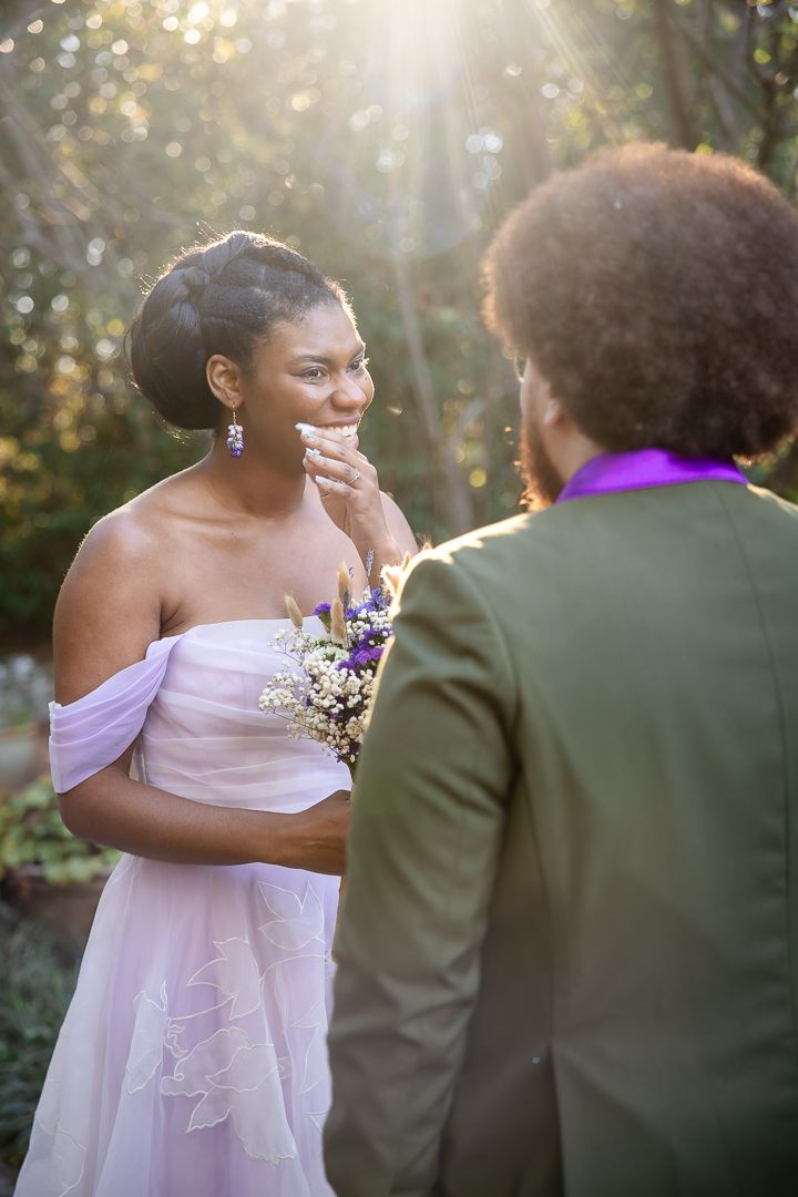 Candid first look moment between bride and groom at Four Oaks Manor wedding venue in Atlanta