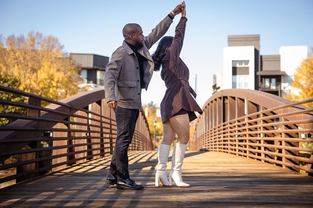 a couple enjoying their engagement session at Millennium Gate Museum in Atlanta