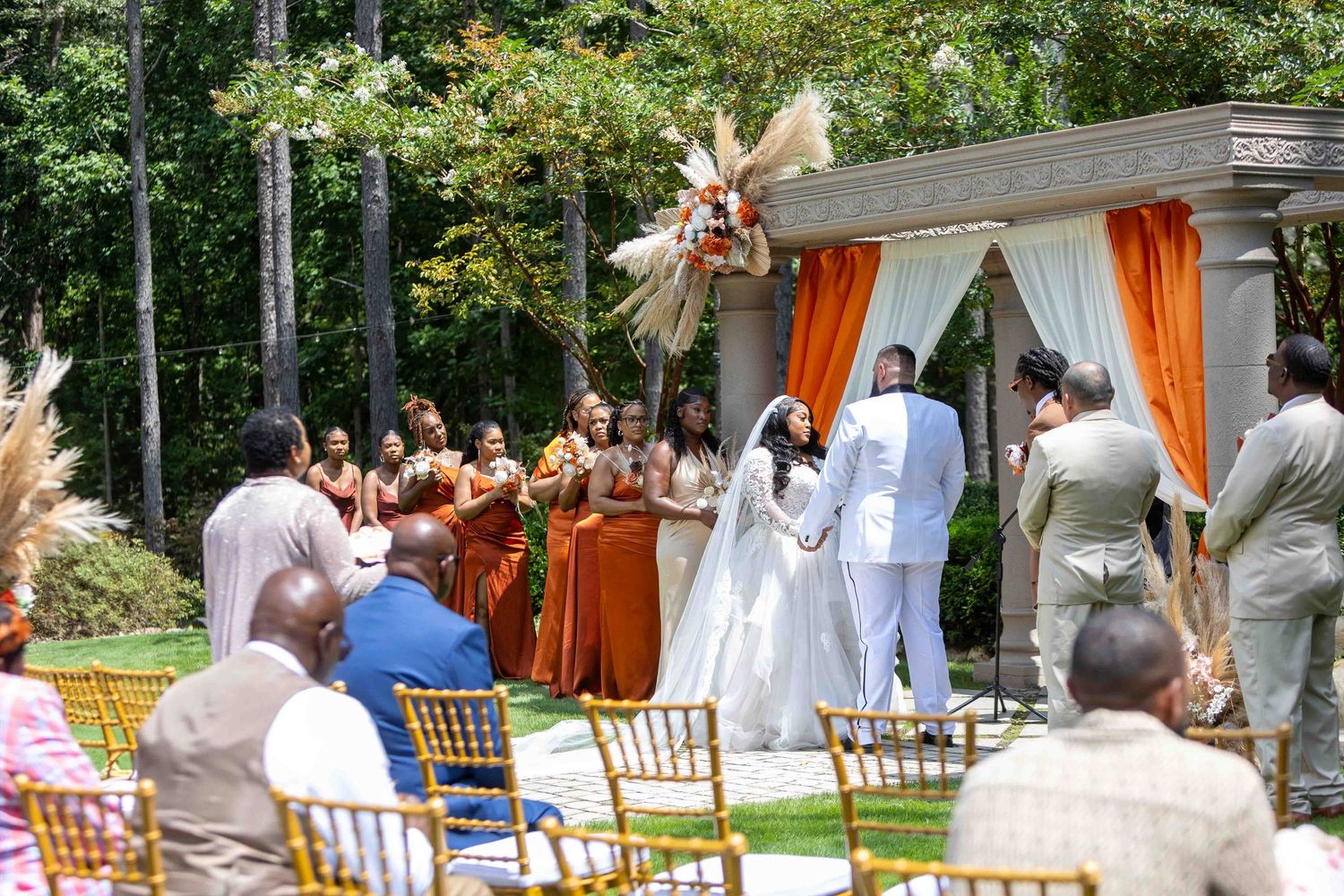 Outdoor wedding ceremony  at The Castle at wildwood gardens