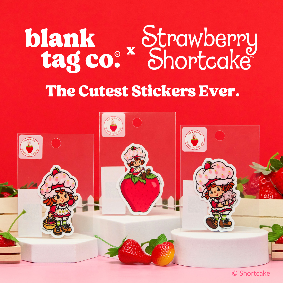 Strawberry Shortcake character stickers displayed on white pedestals against a red background.