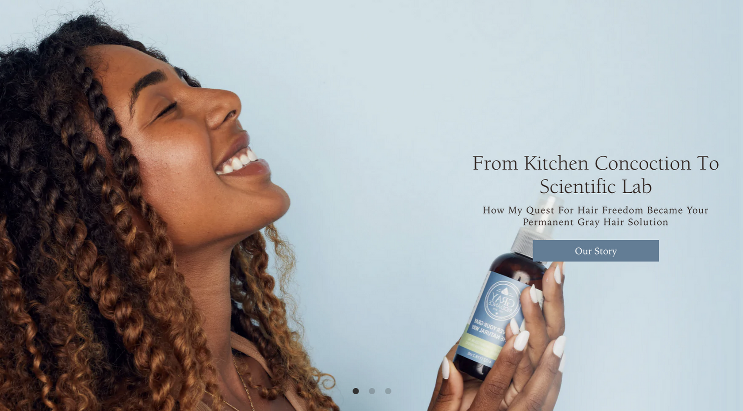 Beauty product advertisement with spray bottle against light background.