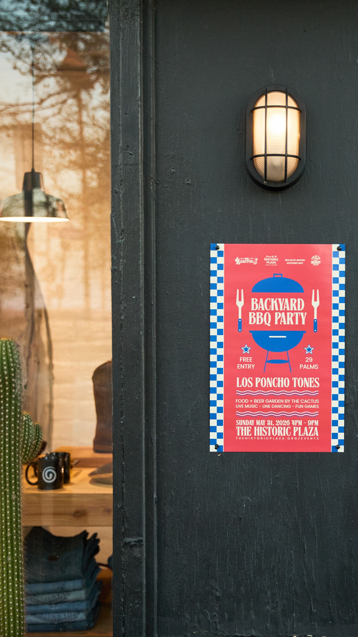 Red and blue Backyard BBQ Party flyer posted on a dark door at The Historic Plaza featuring Los Poncho Tones.