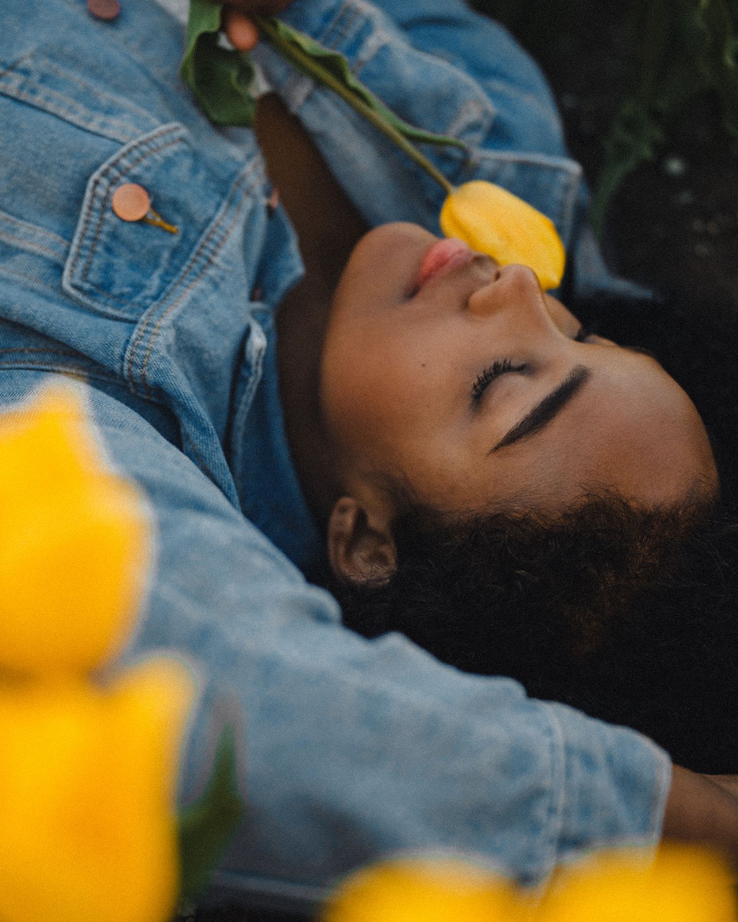Engagement photoshoot among blooming tulips in the Netherlands.