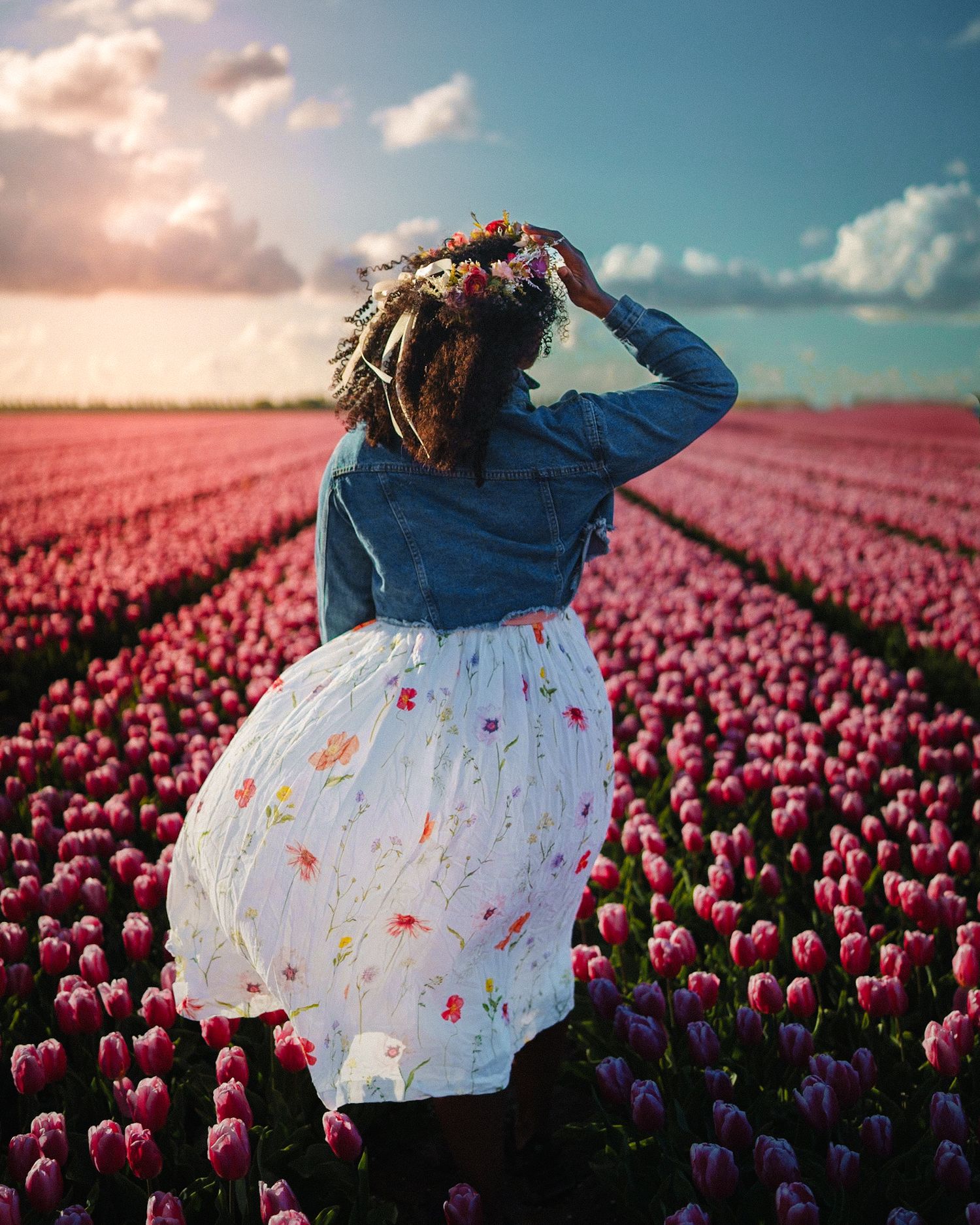Tulip fields photography session with a dreamy floral backdrop in Holland.