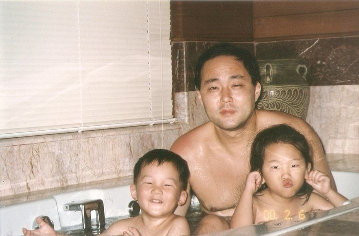 A series of black and white family photographs arranged in a horizontal strip showing multiple candid moments together.
