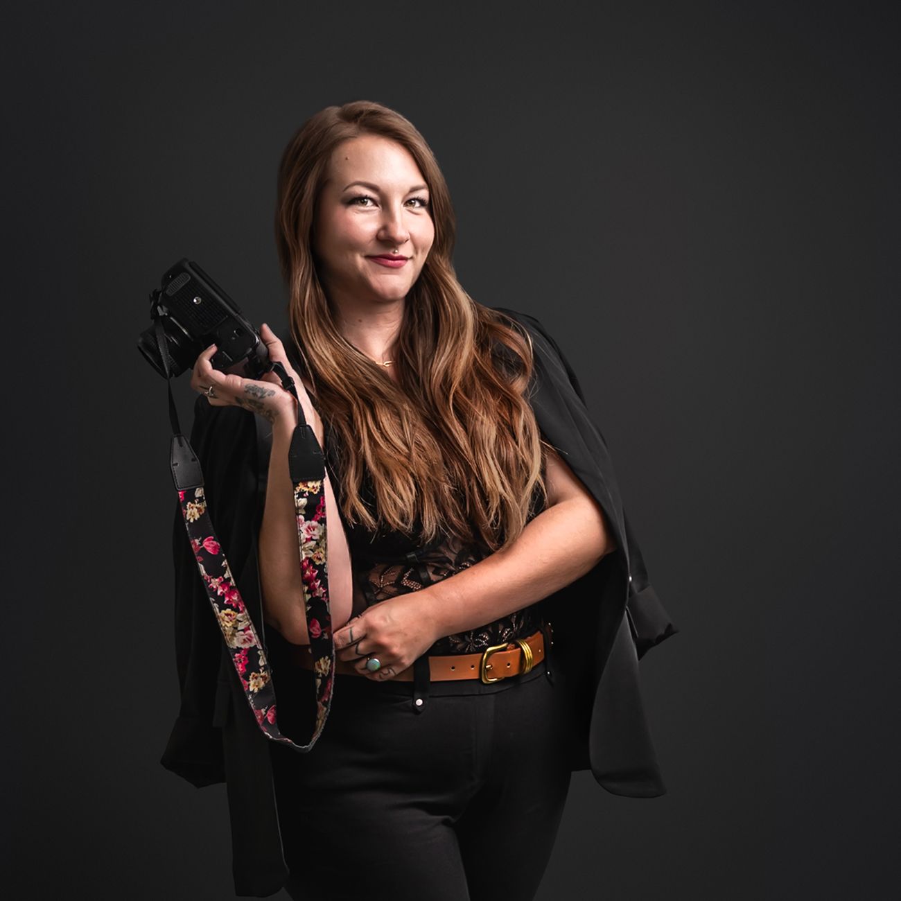 Professional portrait series against dark background showcasing elegant poses in black attire with dramatic lighting.