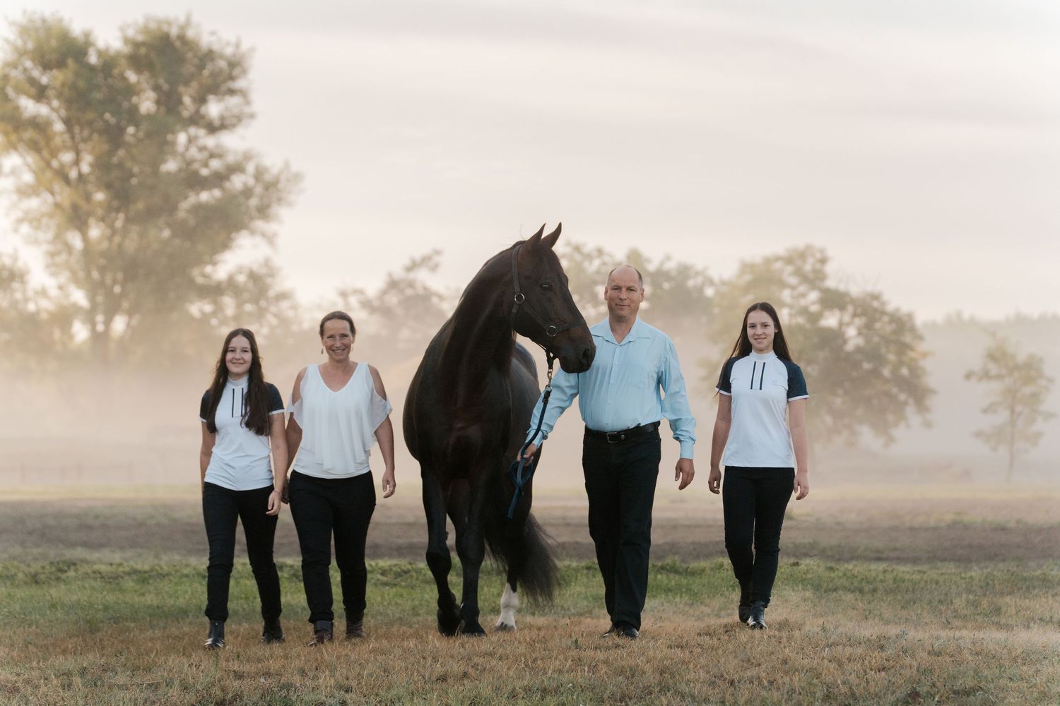 A sequence of photos showing a group walking through a misty field at sunset, creating a dreamy atmospheric effect.