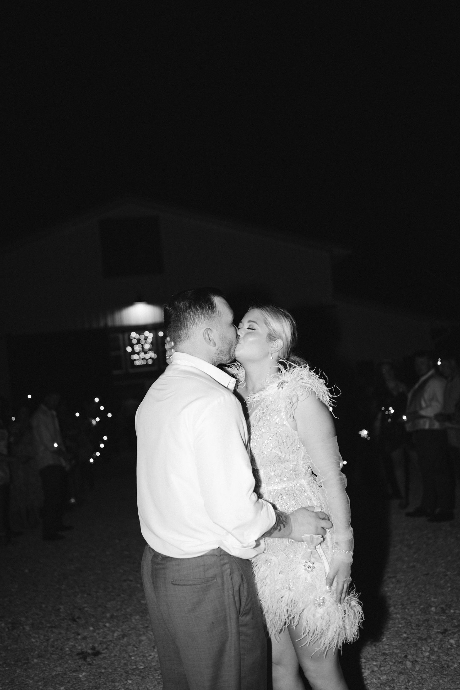 Couple sharing a kiss at Walnut Hall Estate in Carrollton, Illinois.